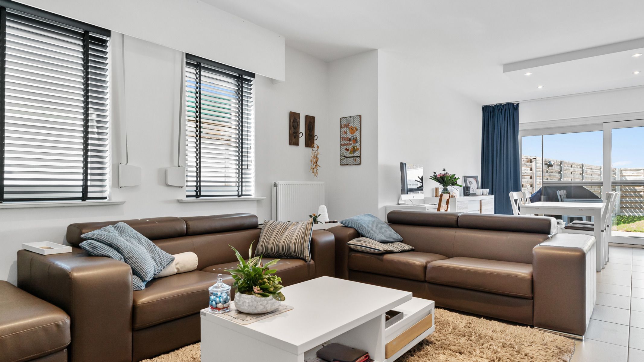 Gelijkvloers appartement met tuin en 2 autostaanplaatsen (1 ondergronds met berging en 1 bovengronds) foto 3