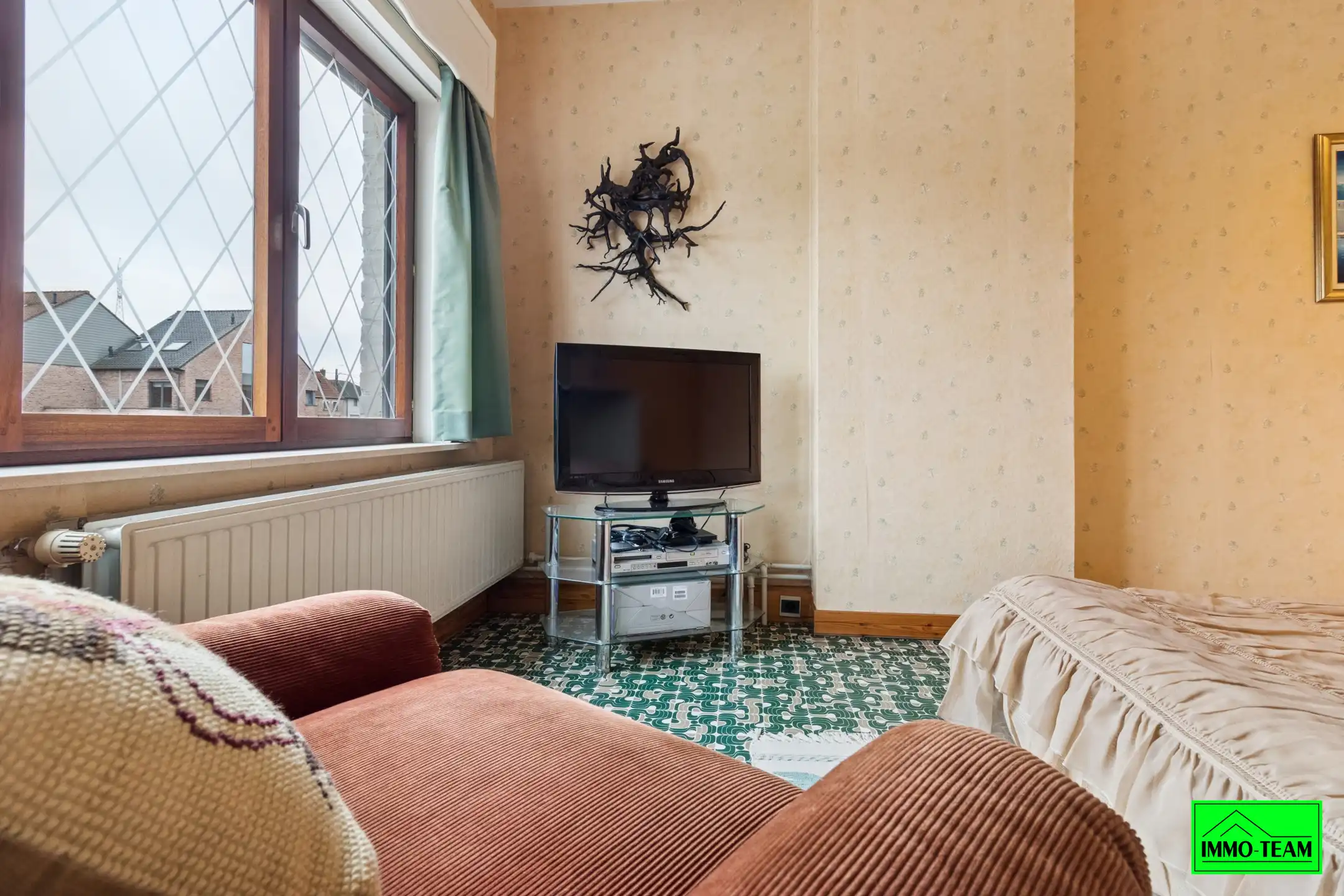 Goed onderhouden 3-gevelwoning met 3 slks, tuin en garage foto 12