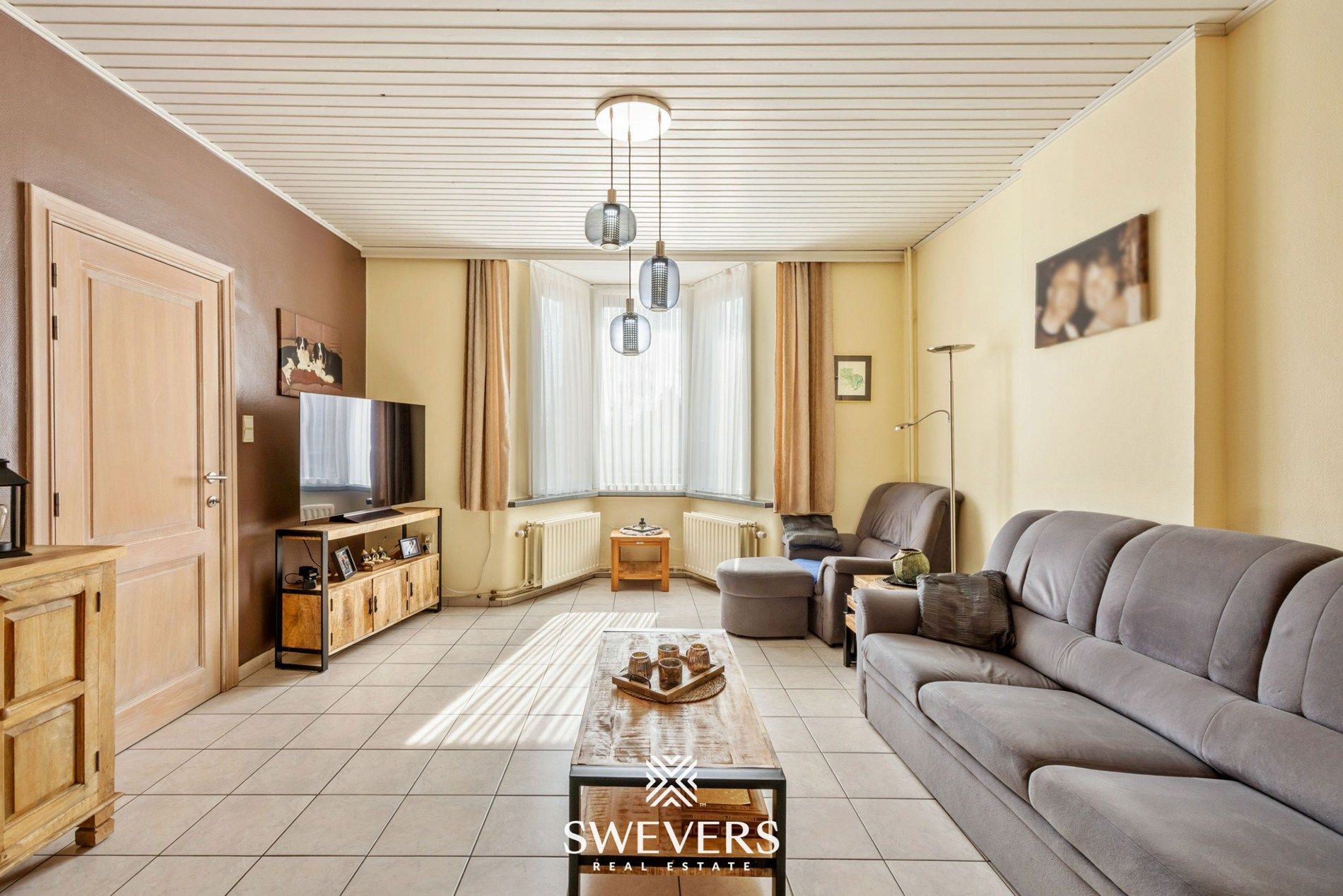 Instapklare gezinswoning met ruimte, tuin en rendement in Leopoldsburg foto 3