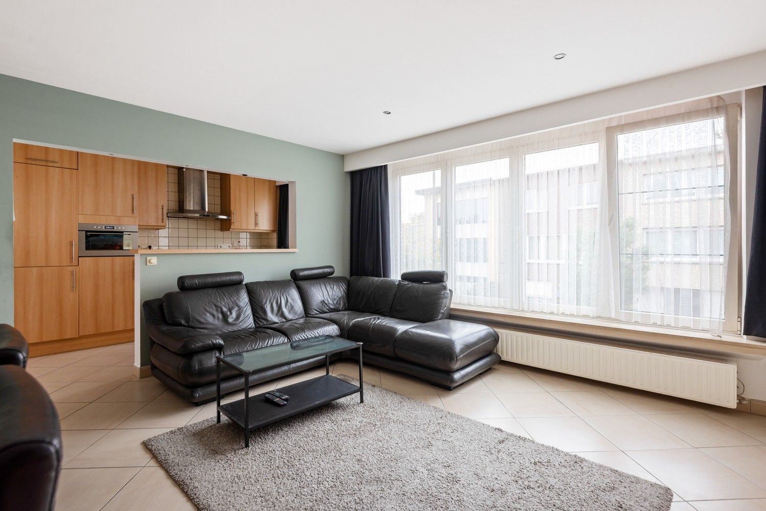 Opbrengsteigendom met 2 appartementen, tuin en garage te koop in Deurne! foto 4