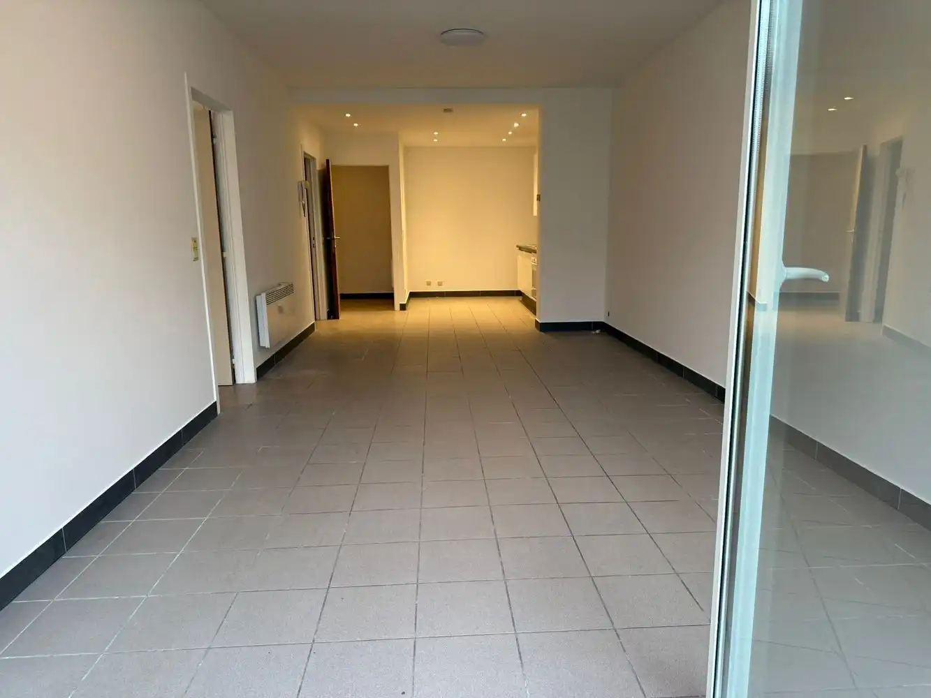 GELIJKVLOERS APP. MET 2 SLAAPKAMERS BRUSSELSESTEENWEG MELLE foto 2