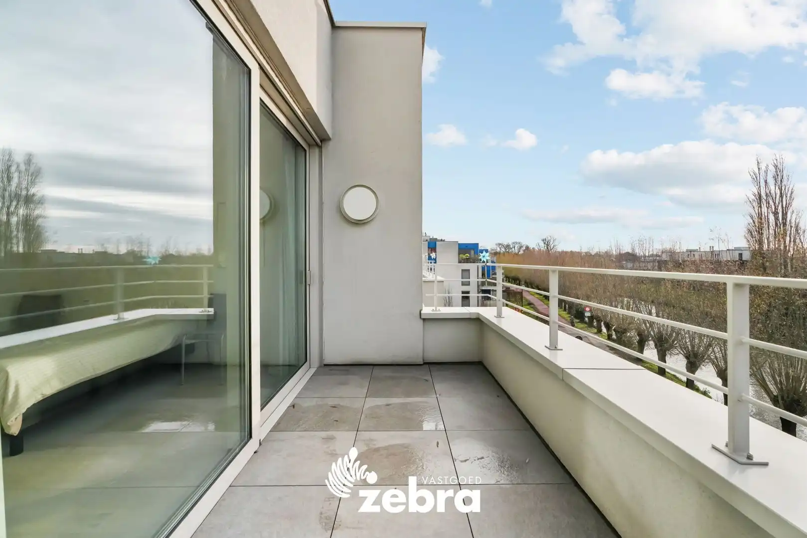 Moderne serviceflat met prachtig zicht op de Leie en autostaanplaats te Deinze! foto 17