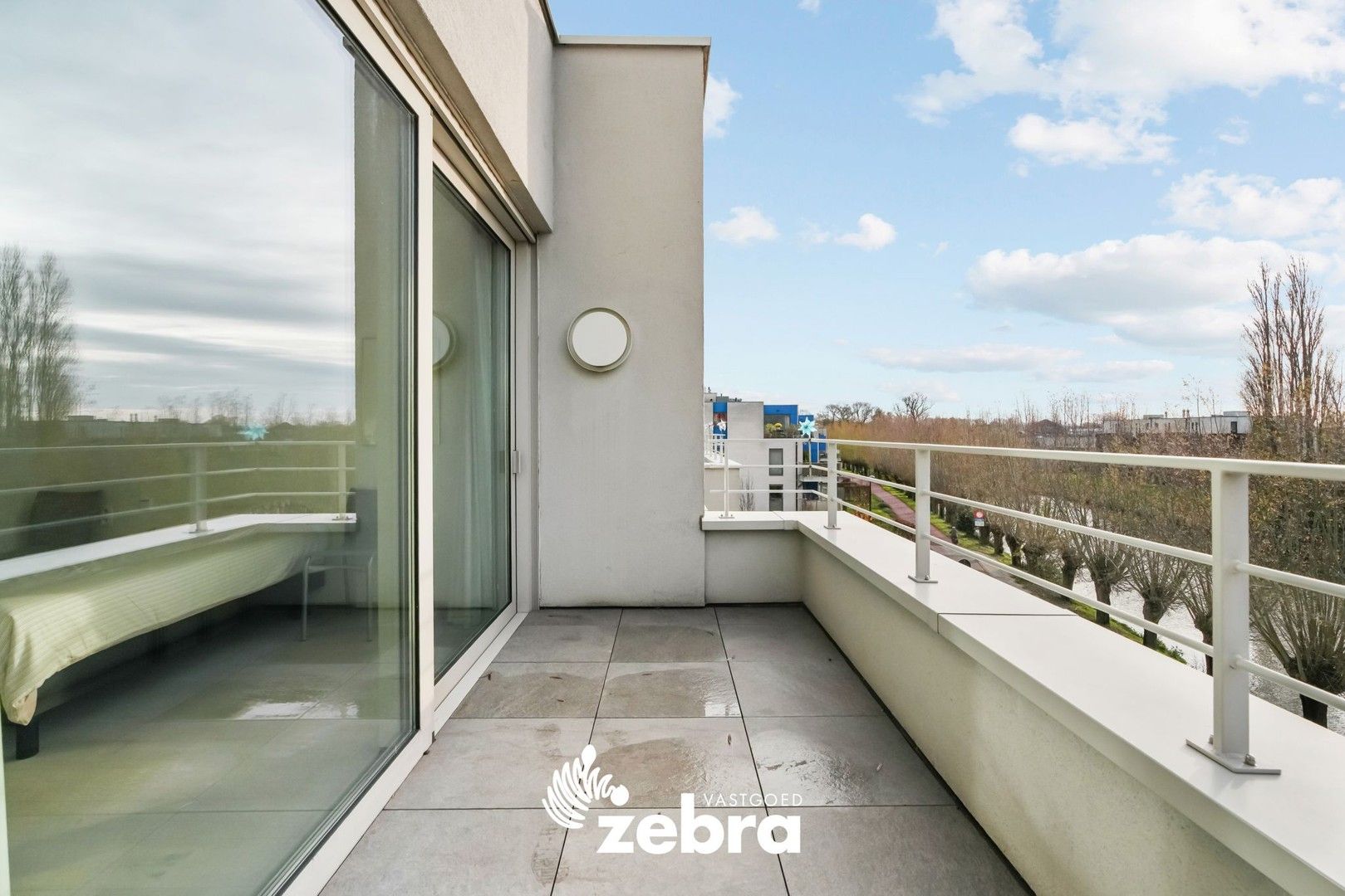 Moderne serviceflat met prachtig zicht op de Leie en autostaanplaats te Deinze! foto 17