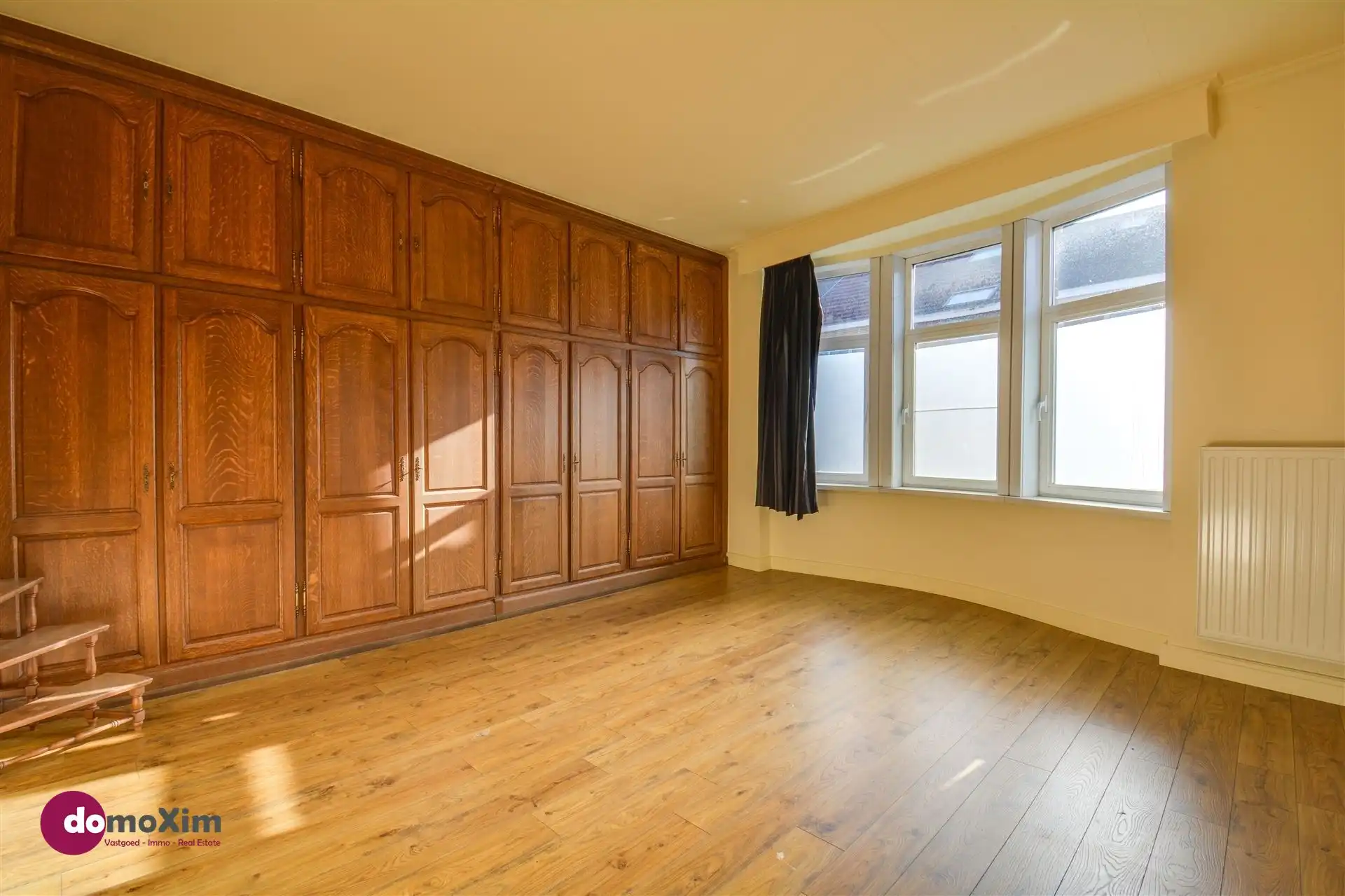 Ruime, karaktervolle stadswoning met twee garageboxen en tuin in Mechelen foto 15