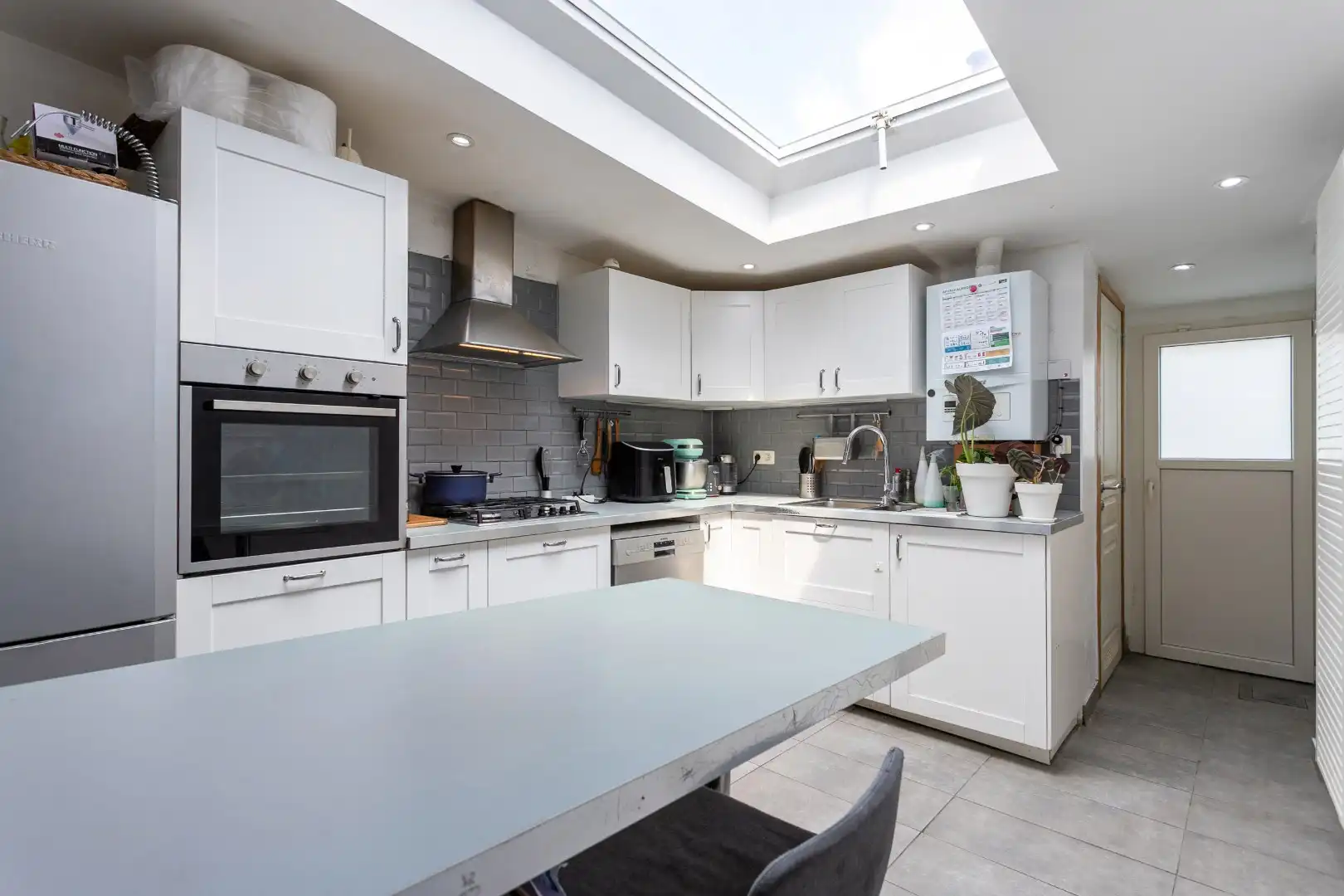 Instapklare woning met 4 slpks en binnenkoer op uitstekende ligging in centrum Halle foto 7