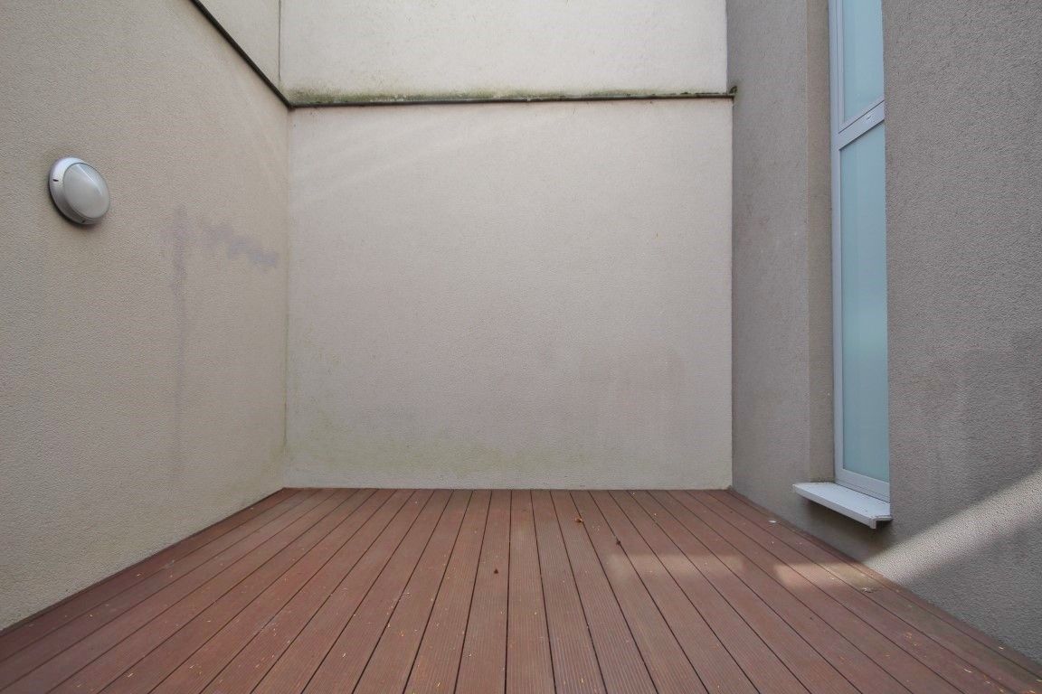 Gelijkvloers appartement met 1 slaapkamer midden in het centrum van Sint-Truiden foto 14