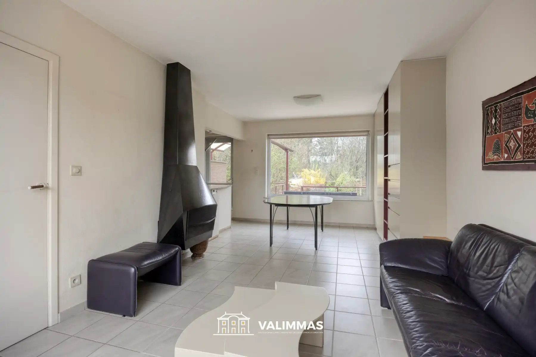 Welgelegen en verzorgde driegevelwoning met garage en tuin foto 4