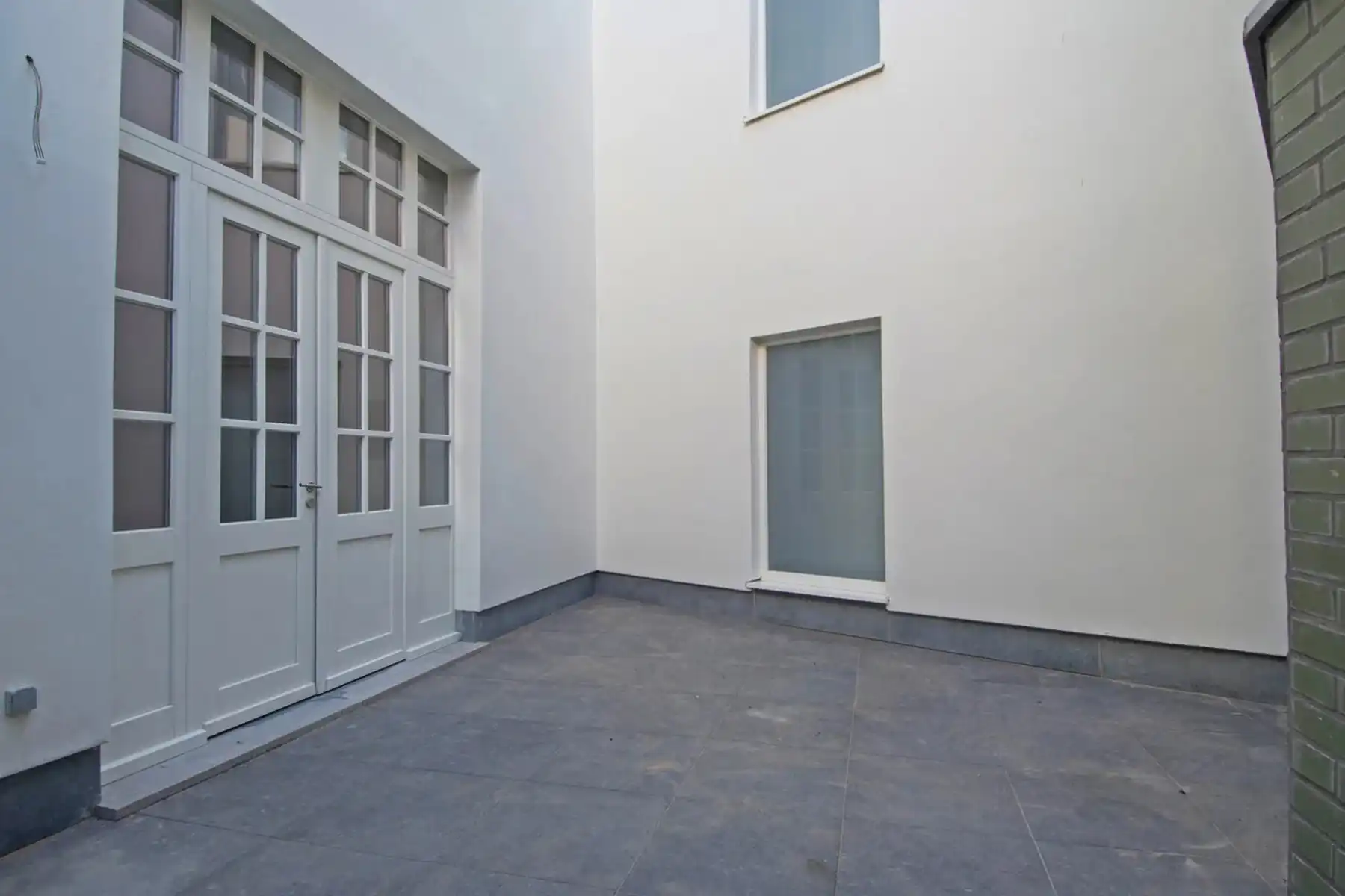 Charmante woning in monumentaal klassegebouw foto 2