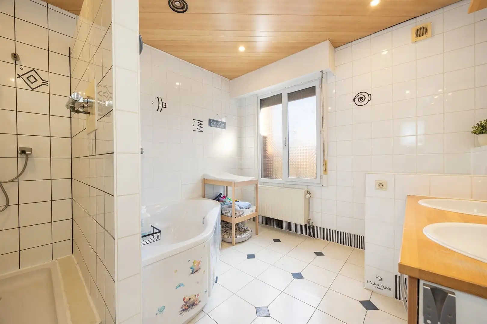 Verrassend ruime woning met 7 slaapkamers en tuin. foto 10