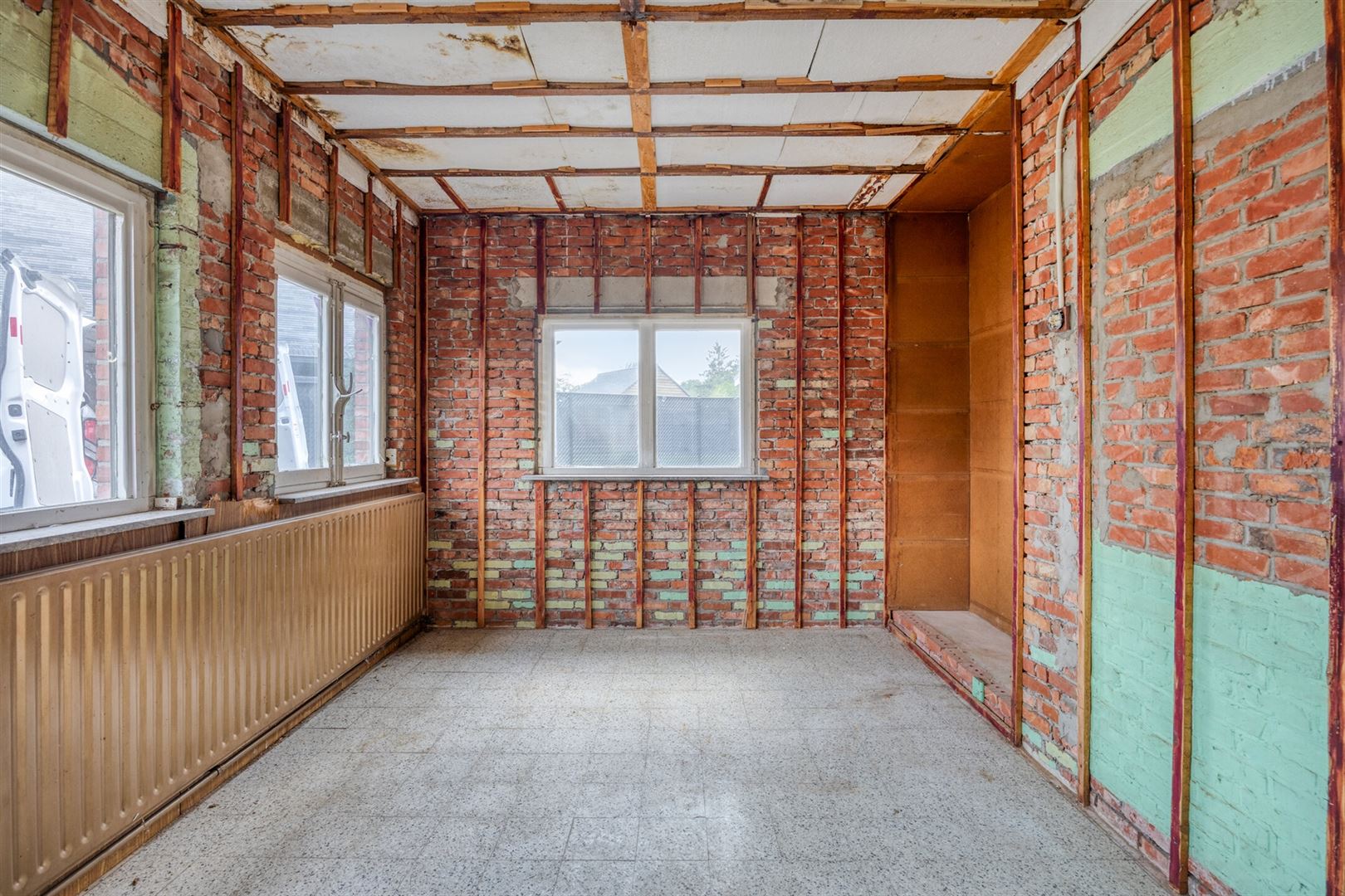 TE KOOP: Te renoveren woning met centrale ligging te Paal!  foto 6