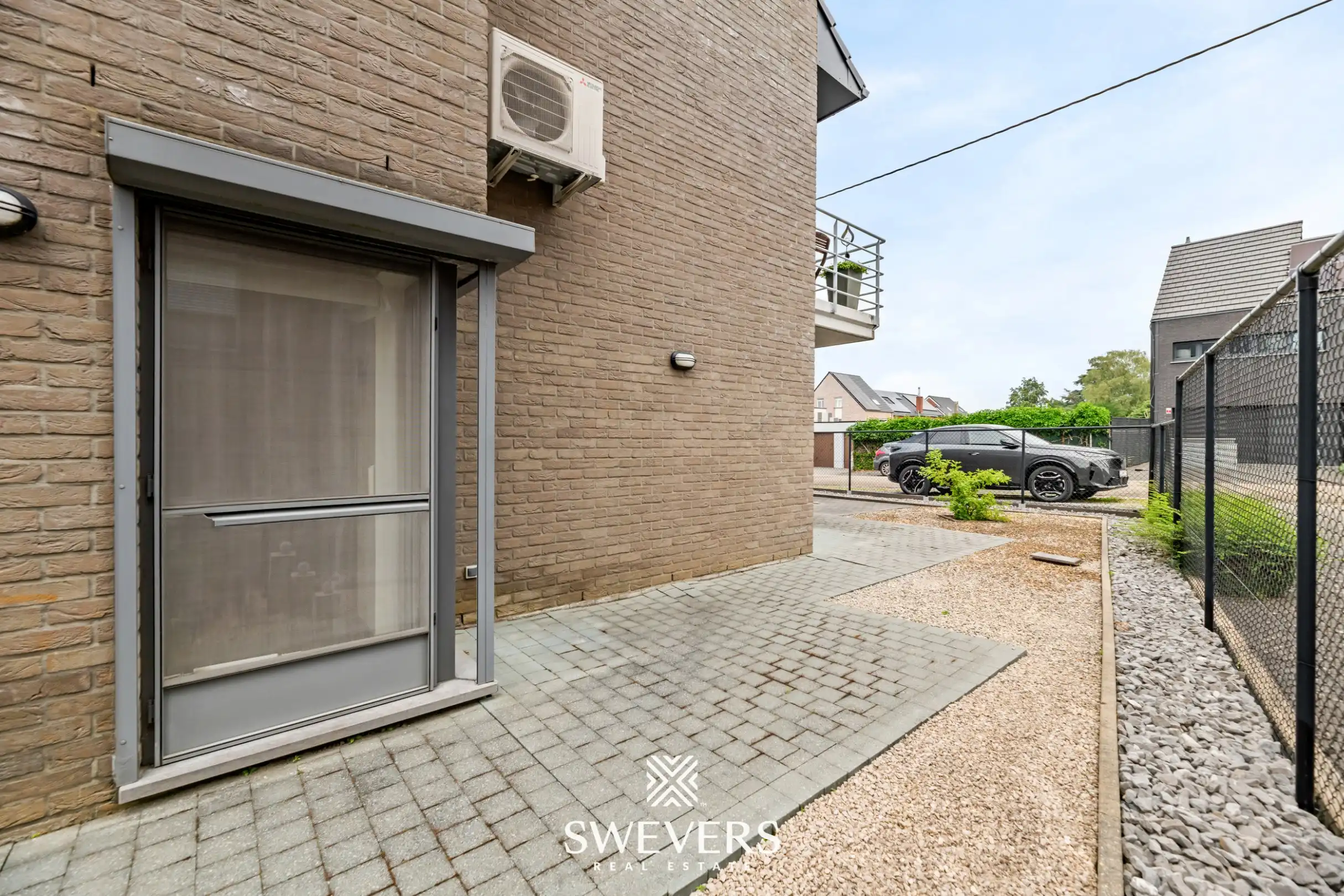 Ruim gelijkvloers appartement met tuin en ondergrondse autostaanplaats foto 28