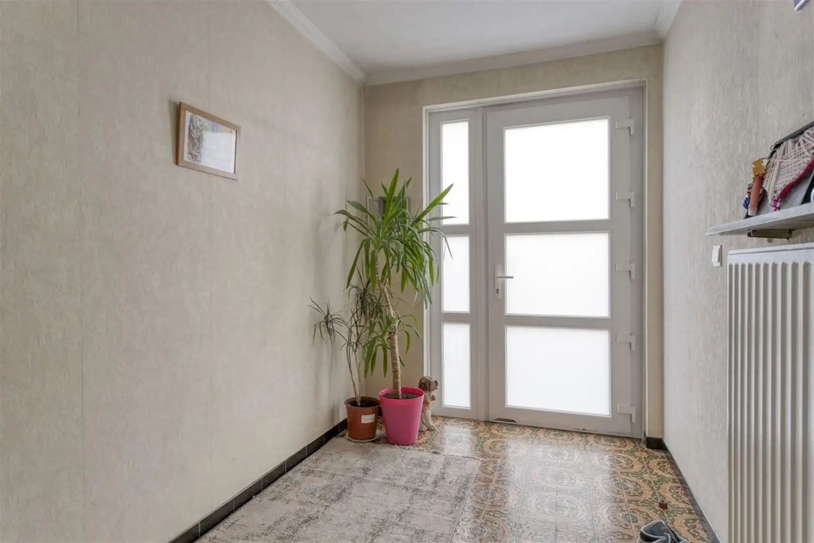 Ruime hoekwoning met 3 slaapkamers, grote zolder en 4 garages. foto 3