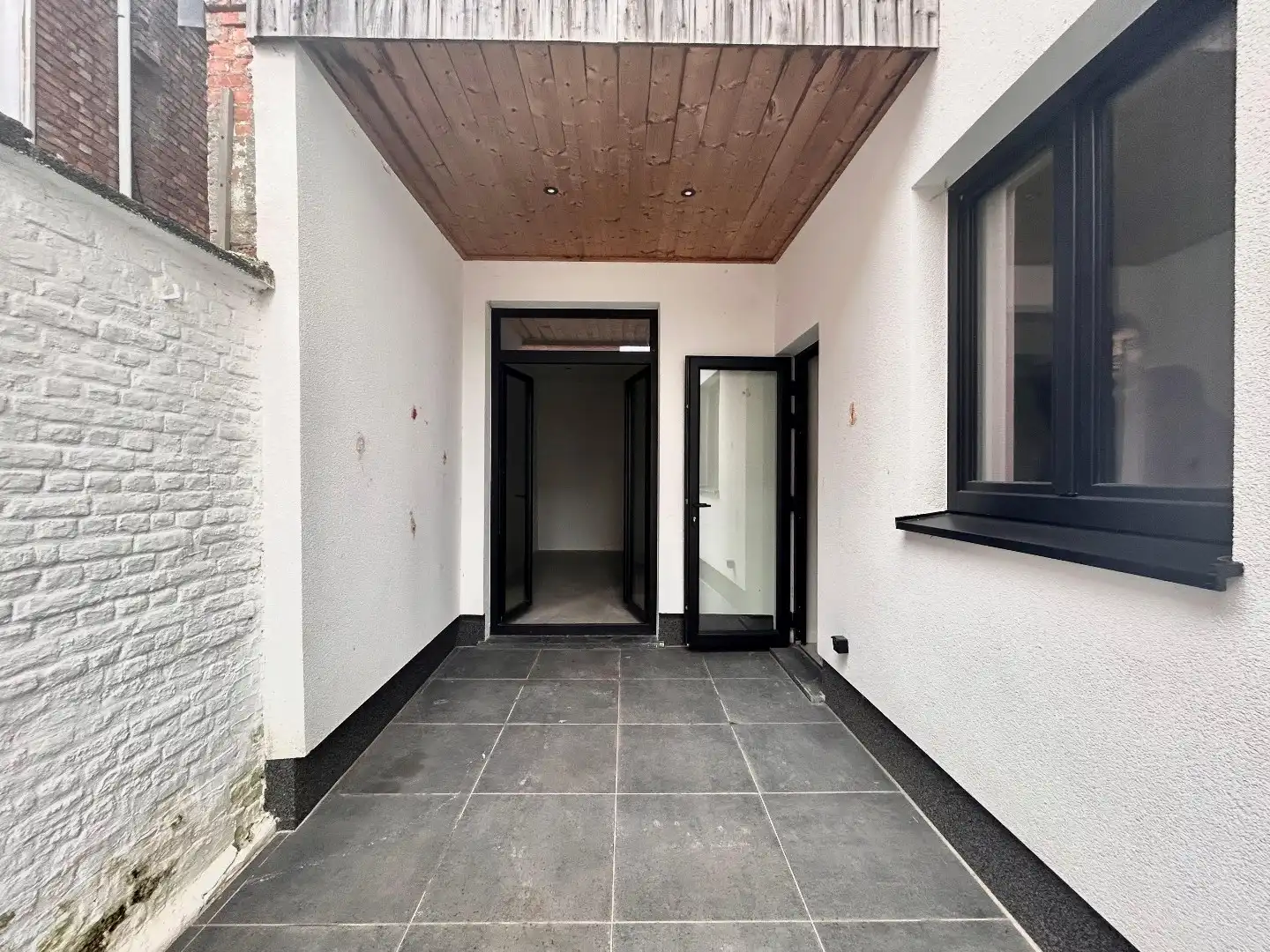 Gezellig gelijkvloers 2-slpk app met tuin. foto 13