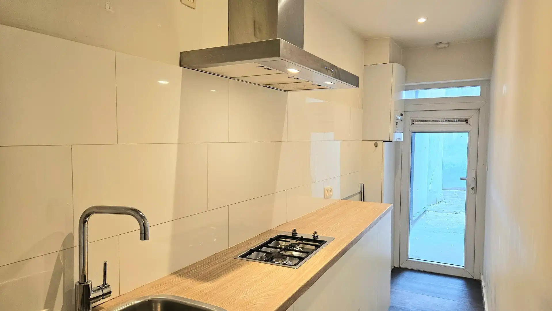 Appartement op het gelijkvloers met koer foto 8