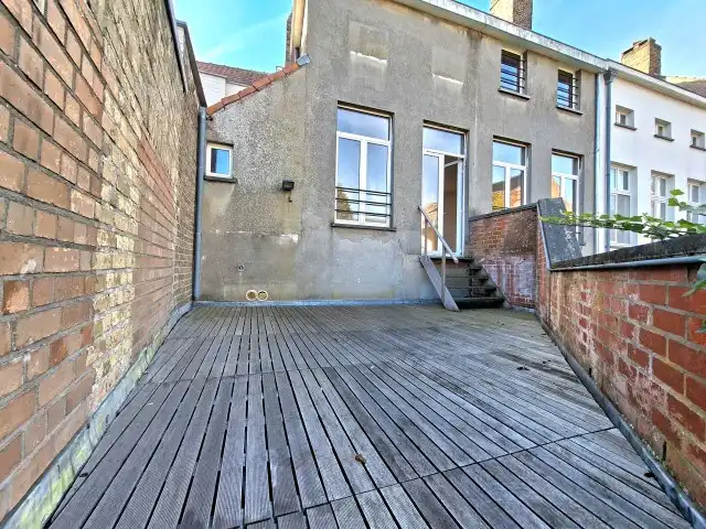 Ruim duplex appartement met tuintje foto 3