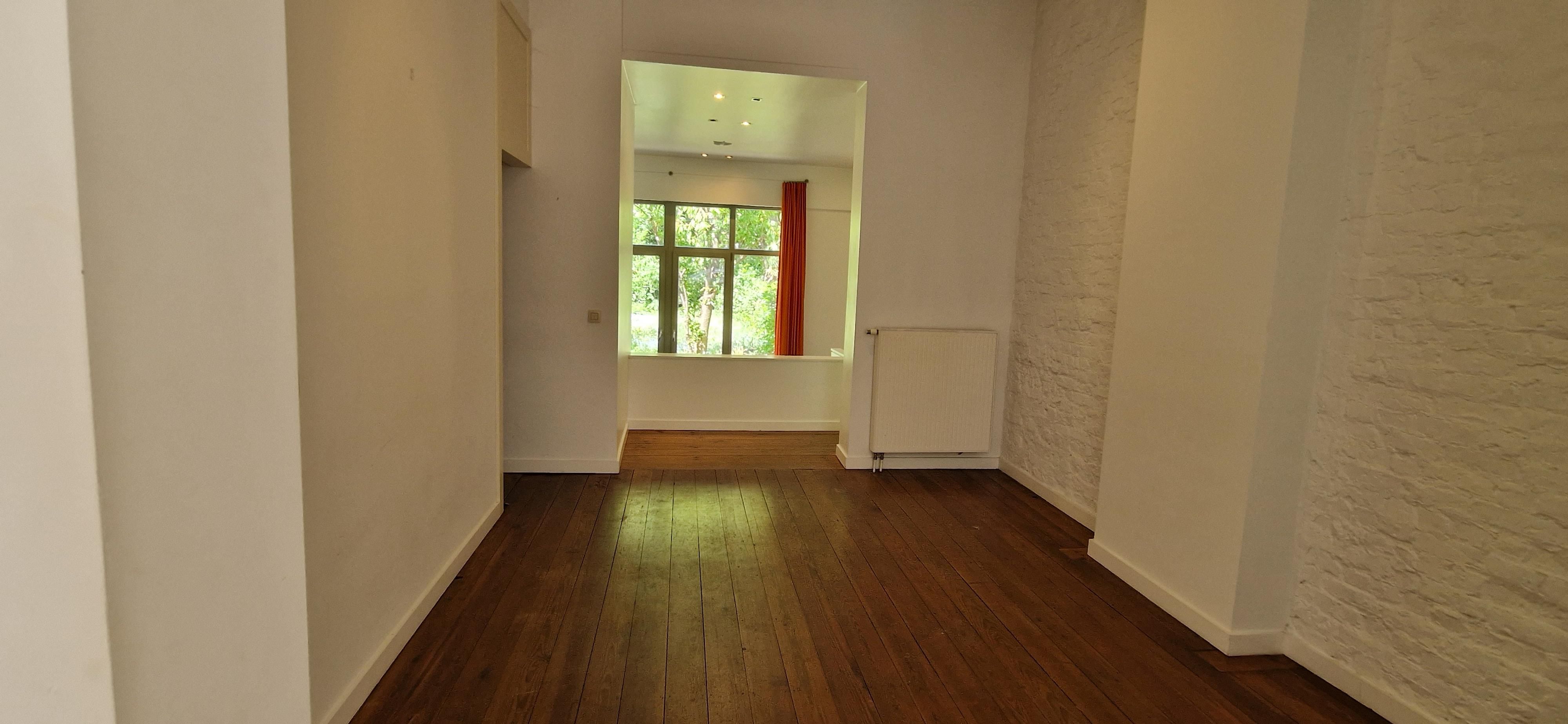 Karaktervolle HERENWONING met mooie leefruimten, 4 slaapkamers en een rustgevende tuin  op 1 are 70 ca.   foto 8