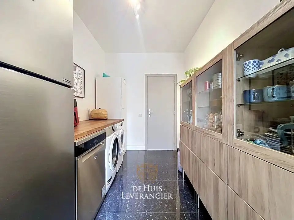 Instapklare rijwoning met tuin op rustige ligging te koop in Lint foto 9
