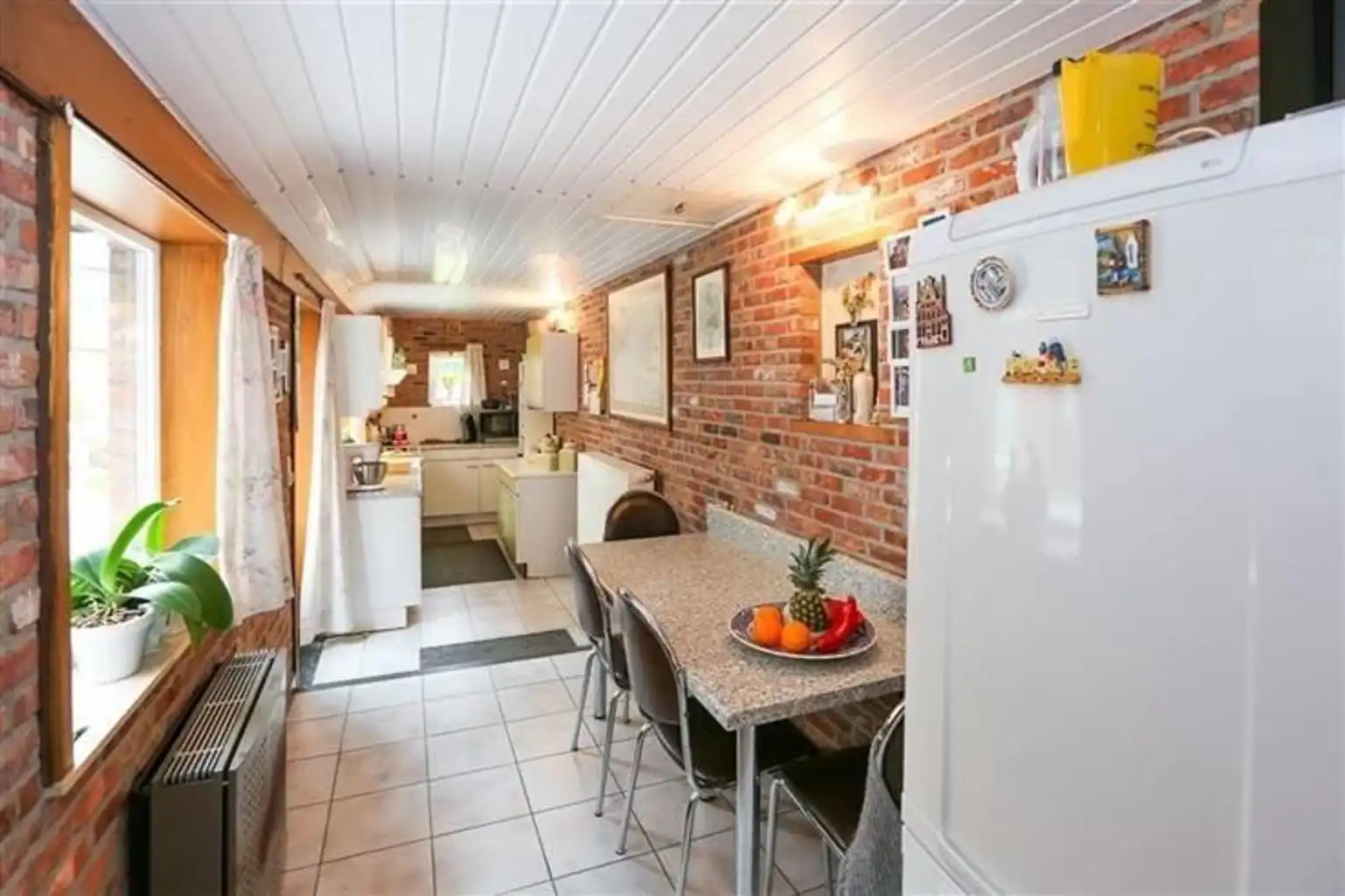 Te koop: te renoveren rijwoning op toplocatie foto 17