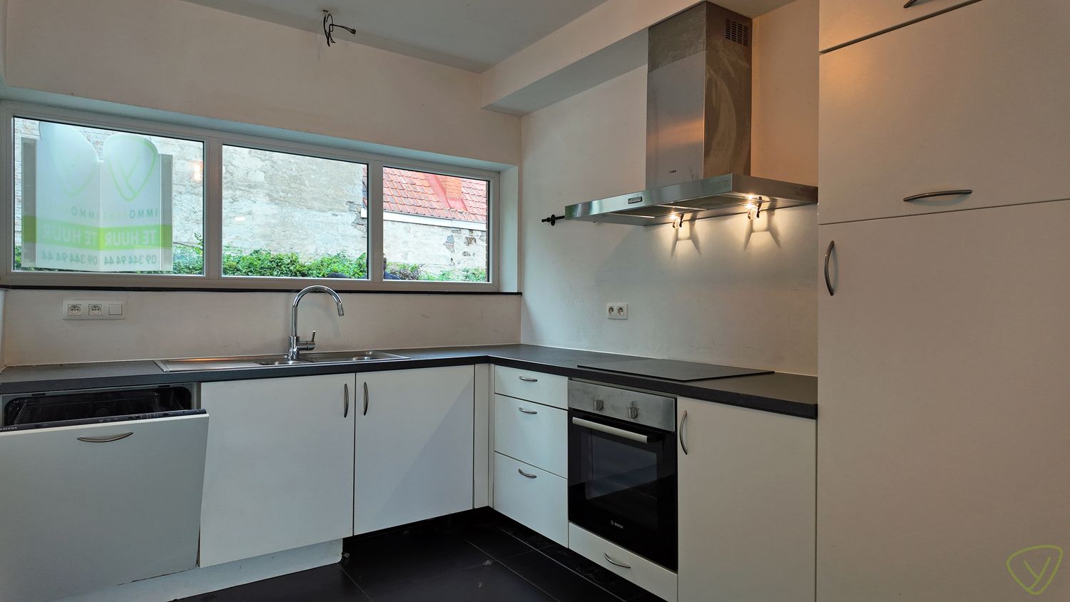 Recente gezinswoning met zonnige tuin, garage en centrale ligging! foto 5