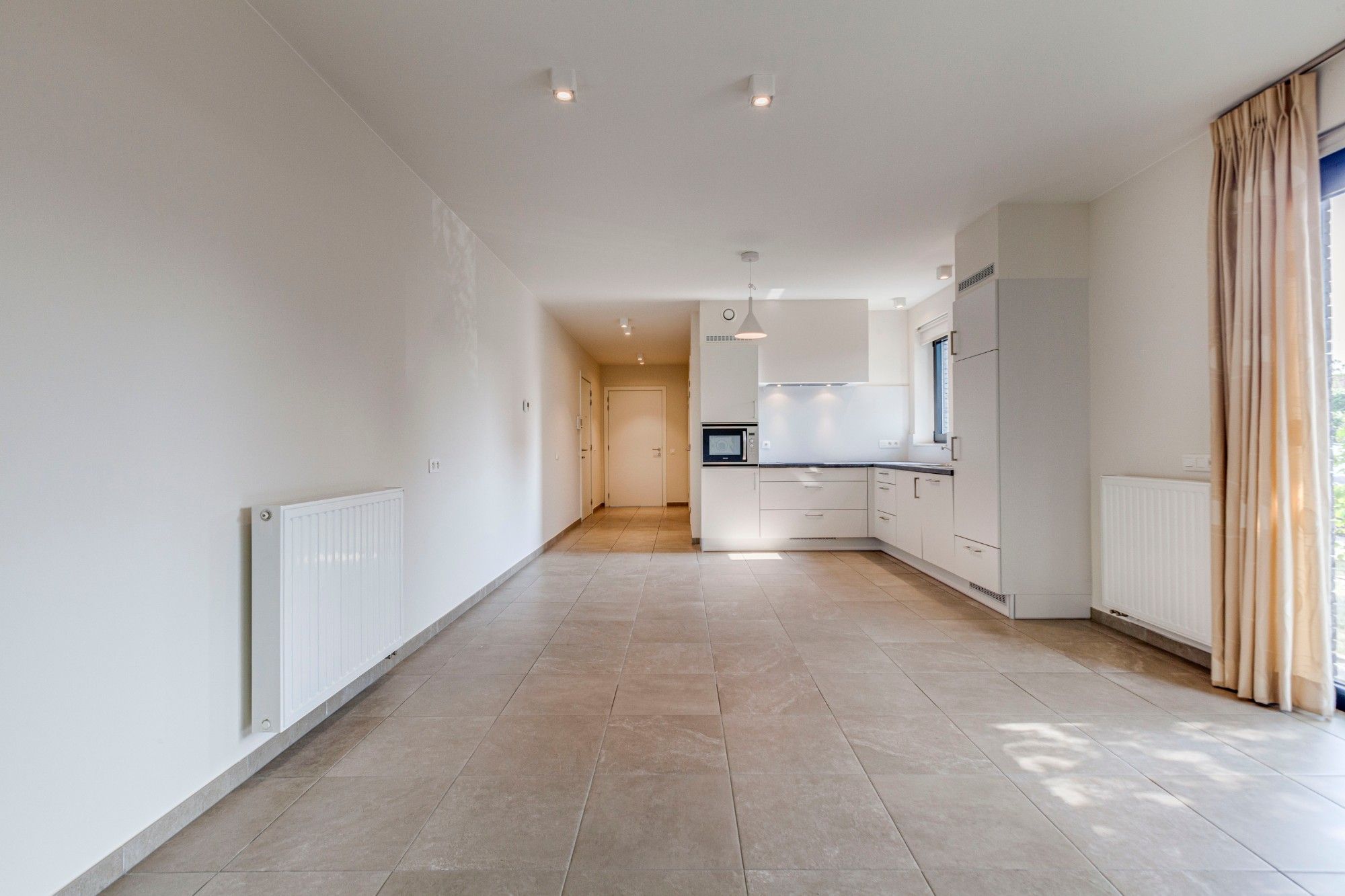 Geniet van zorgeloos comfort in deze gelijkvloerse assistentiewoning met autostaanplaats foto 3