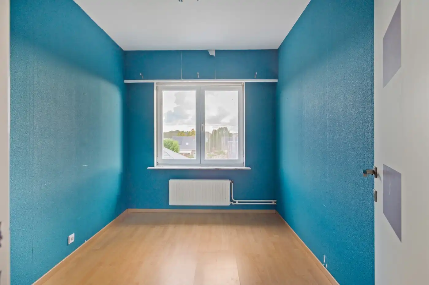Ruime, instapklare bel-etagewoning met 3 slpk., inpandige garage en tuin foto 16