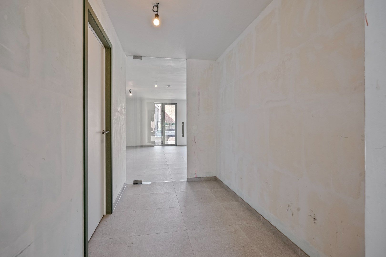 Luxueus gelijkvloers 3-slaapkamerappartement met tuin en terras! 6% BTW mogelijk  foto 8