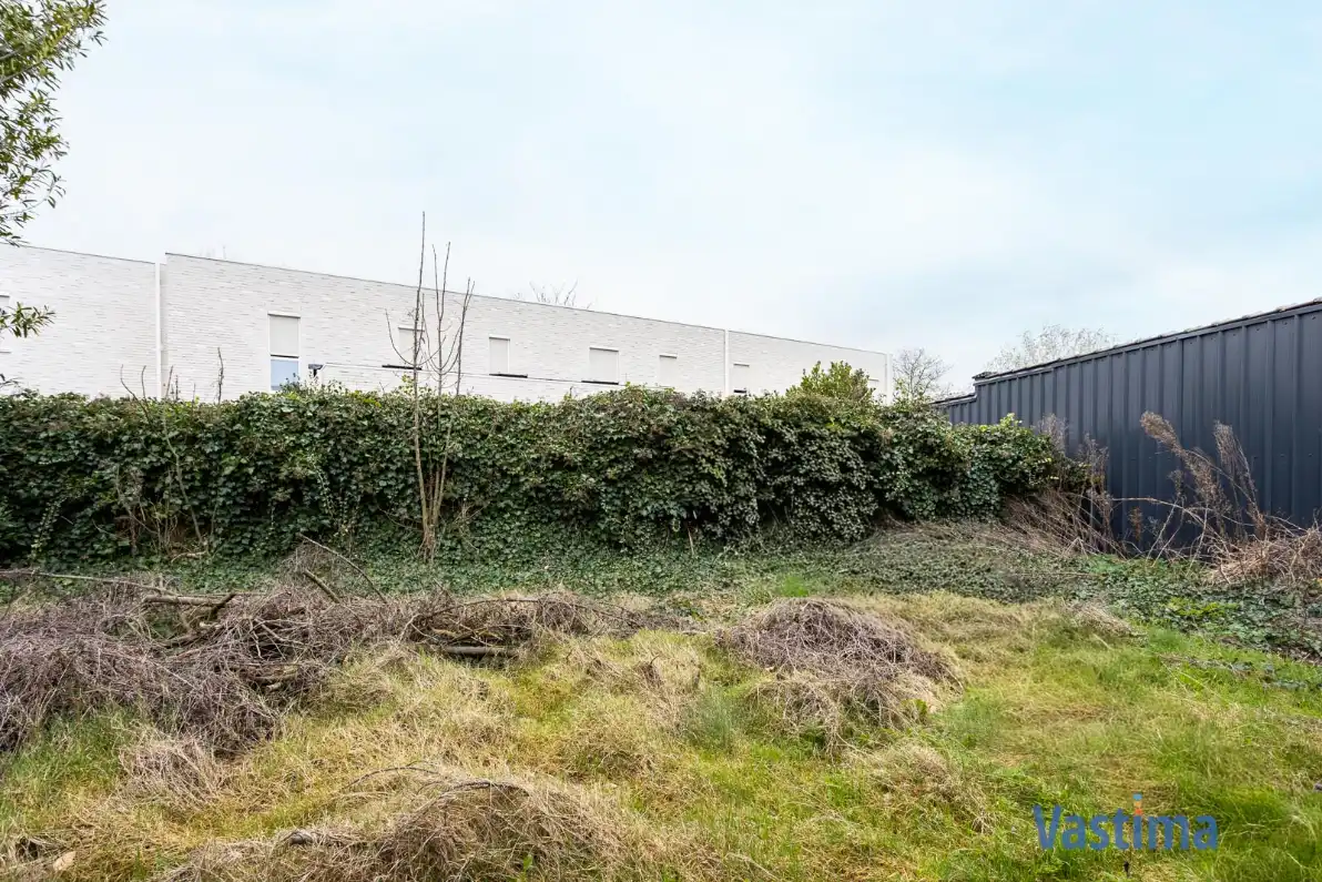 Unieke bouwgrond in het hart van Merchtem foto 12