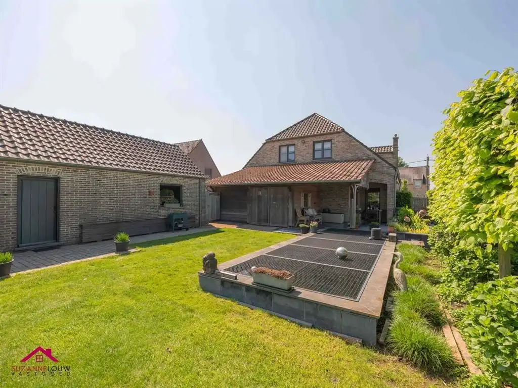 Charmante vrijstaande woning met sfeervol aangelegd terras foto 7
