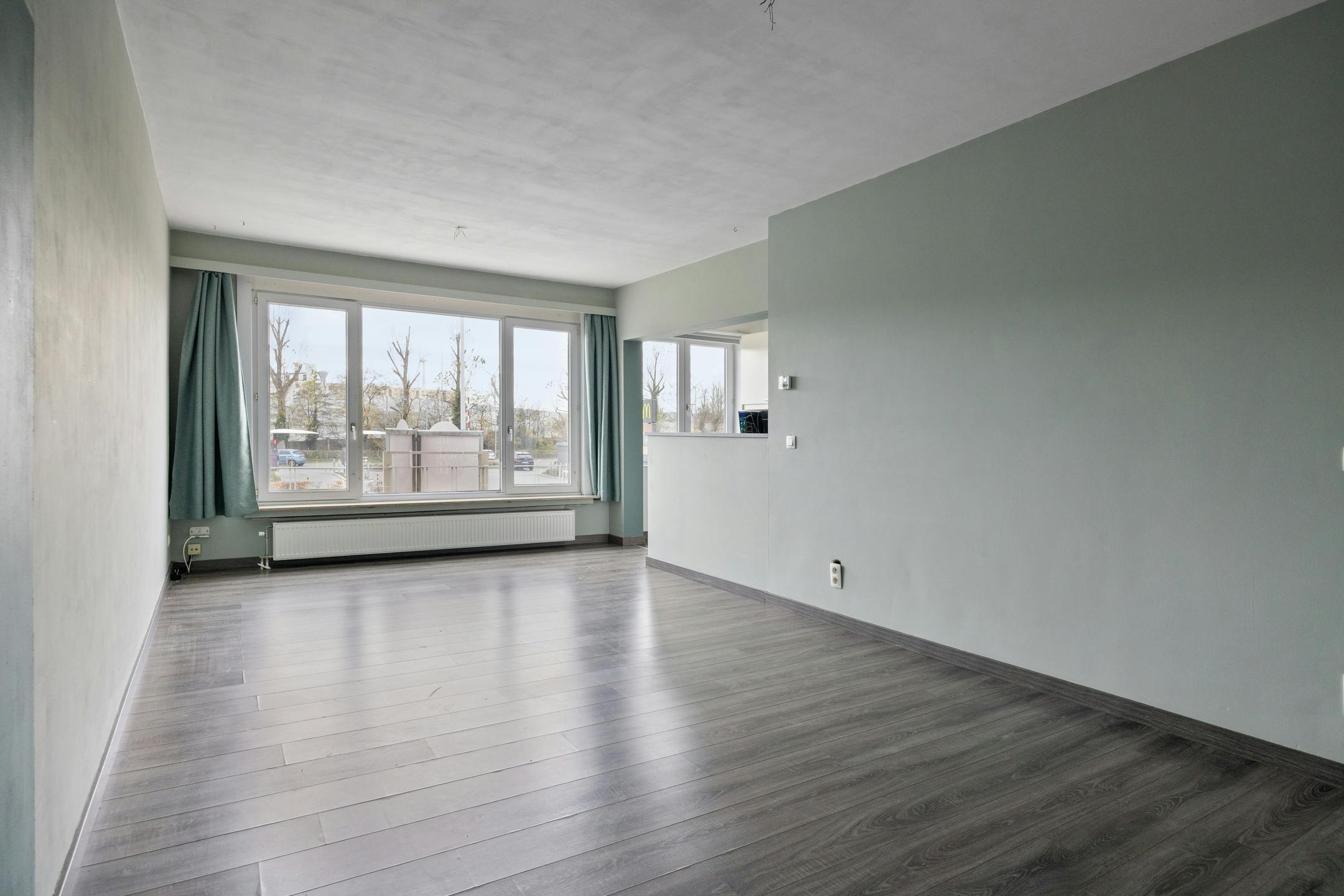 Energiezuinig appartement mét garage te koop in Merksem  foto {{pictureIndex}}