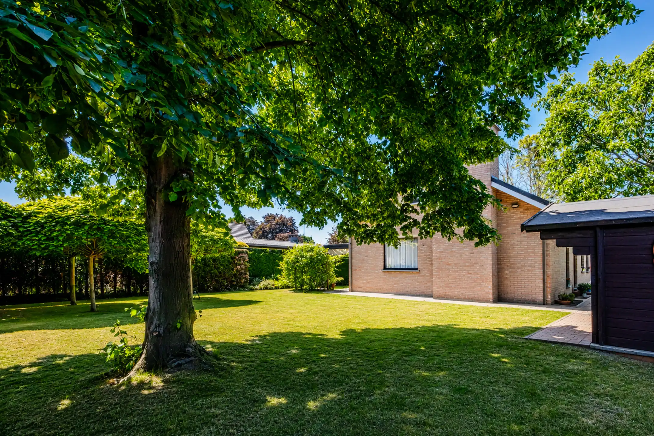 Rustig gelegen woning met 4 slaapkamers en tuin te Drongen  foto 4