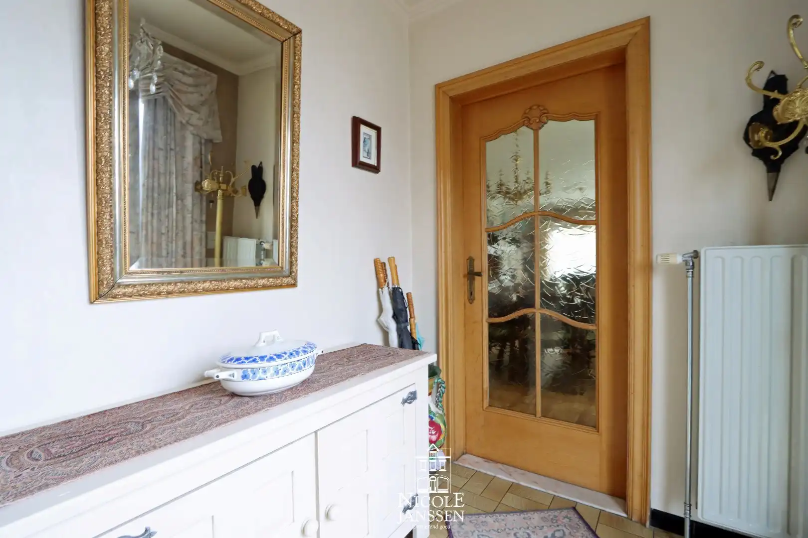 Verzorgde gelijkvloerse woning met tuin in verzorgde straat in centrum van Dilsen foto 3