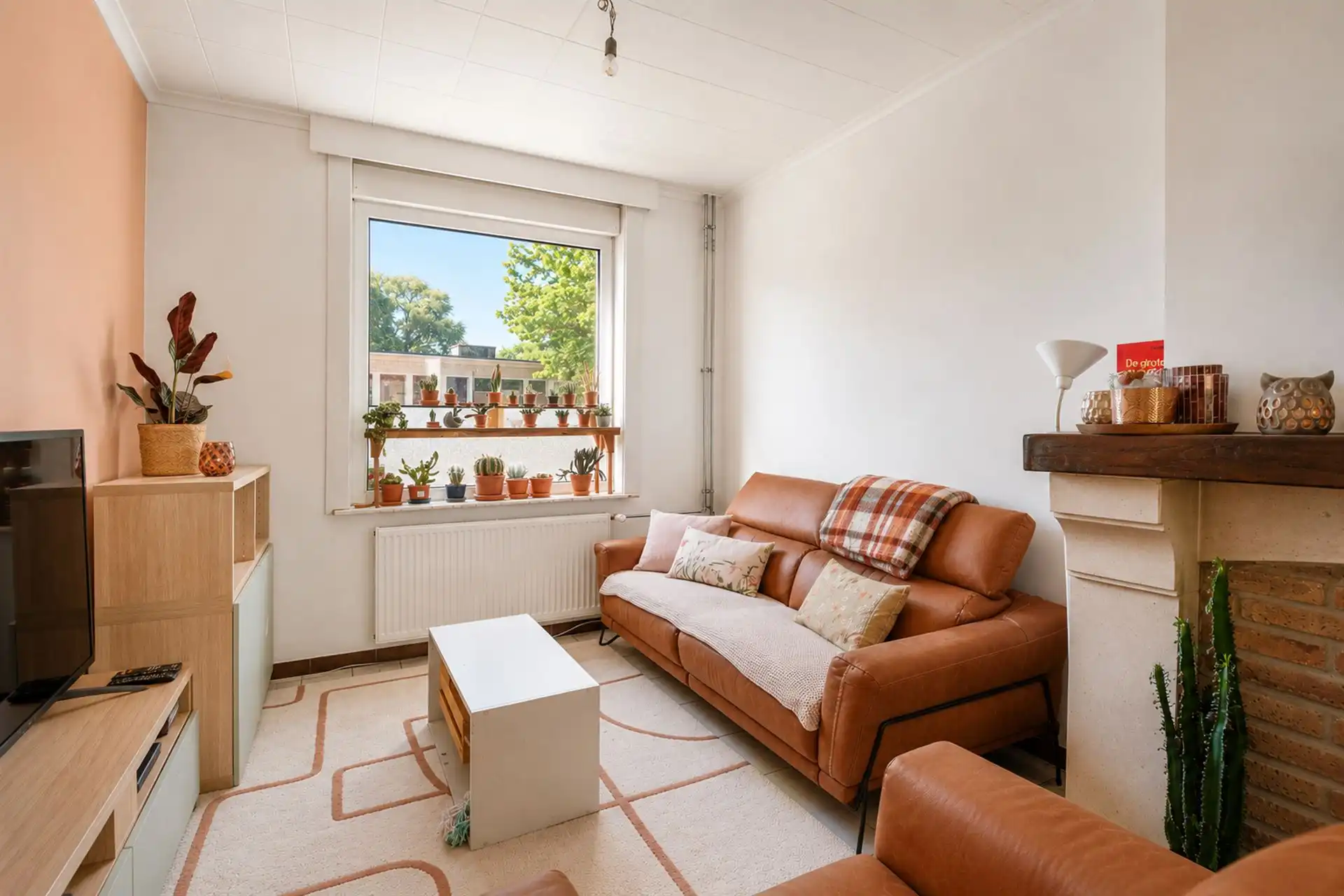 Gezellige instapklare woning met 3 slpk, koer en tuintje foto 12