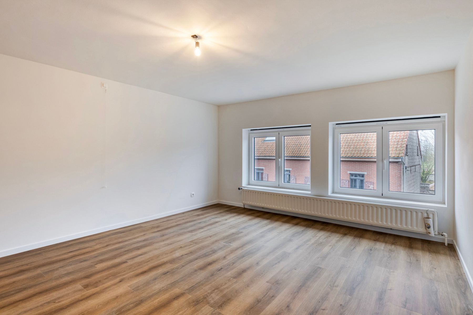 Instapklare woning met 3 slpk, garage en tuin! foto 12