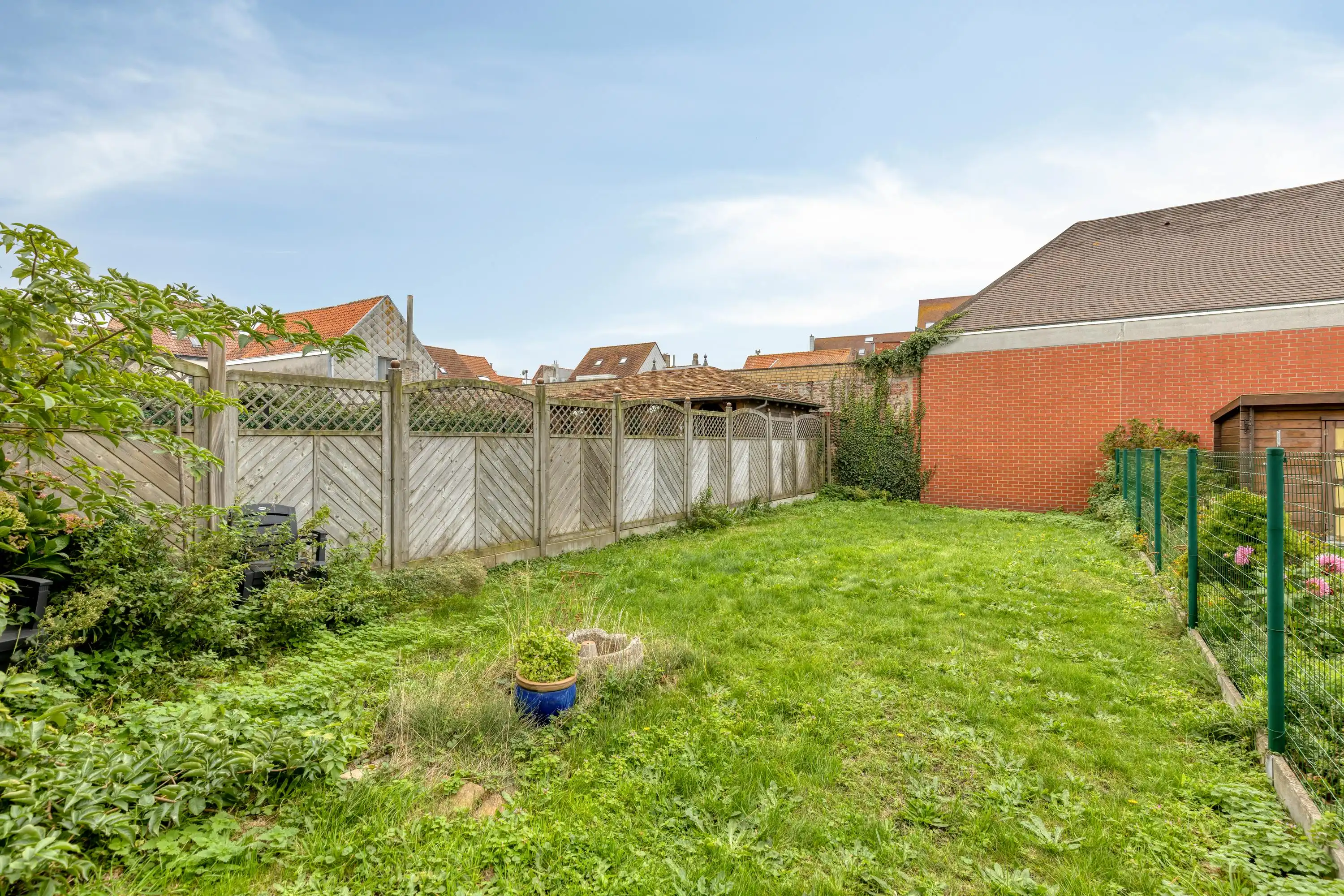 Ruime bel-étage met tuin te koop in het centrum van Heist foto 2