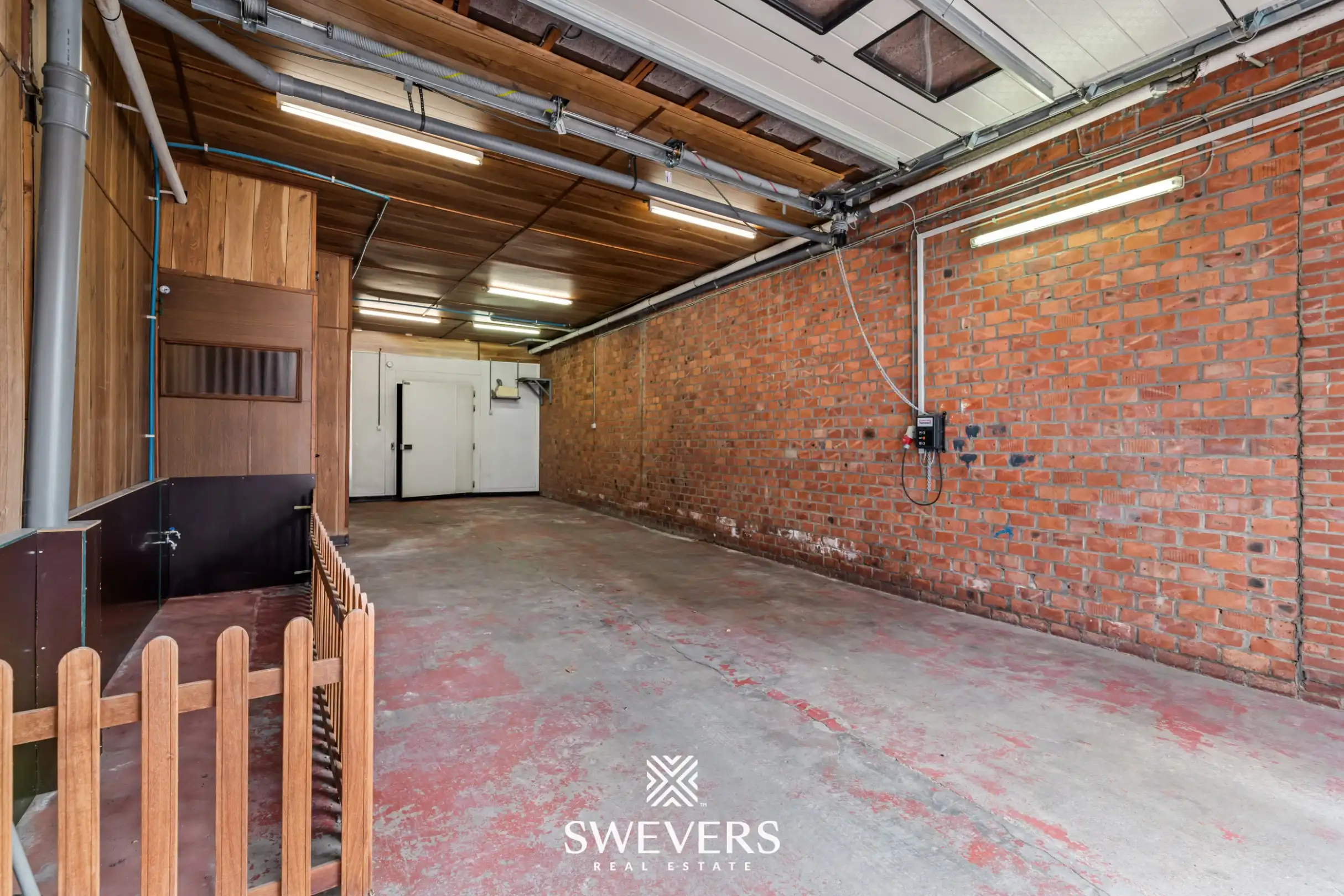 223 m² woonruimte met uitzonderlijke garage van ca. 100 m² nabij centrum foto 16