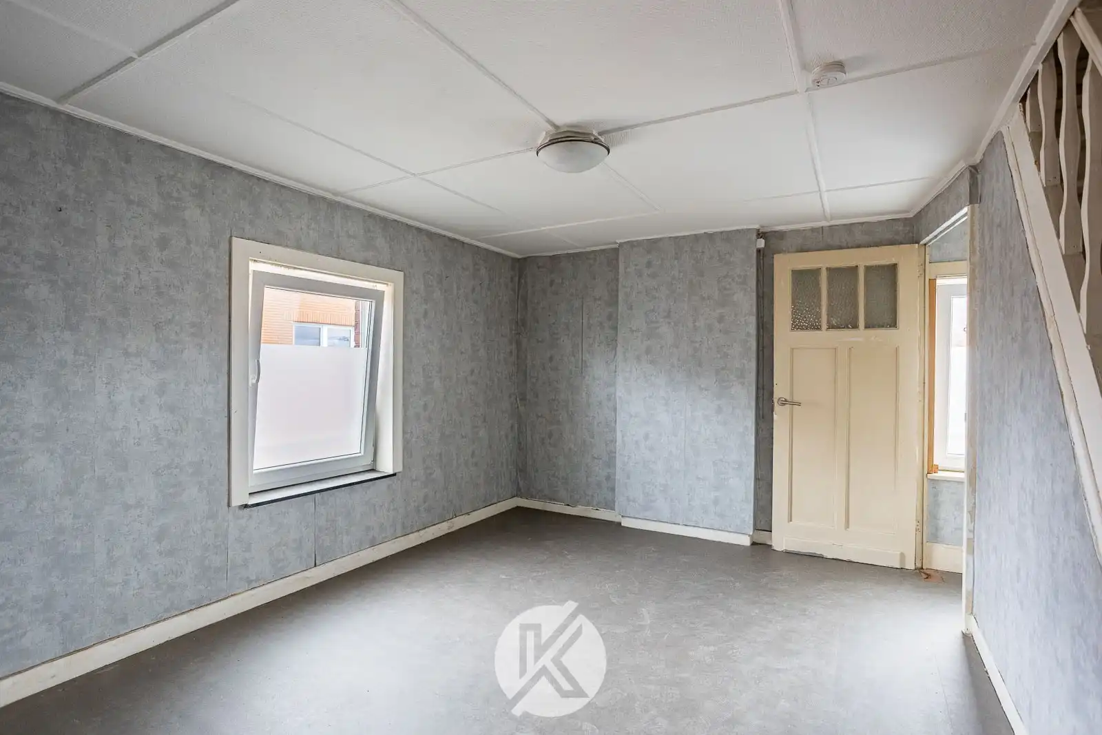 Te renoveren woning met garage foto 12