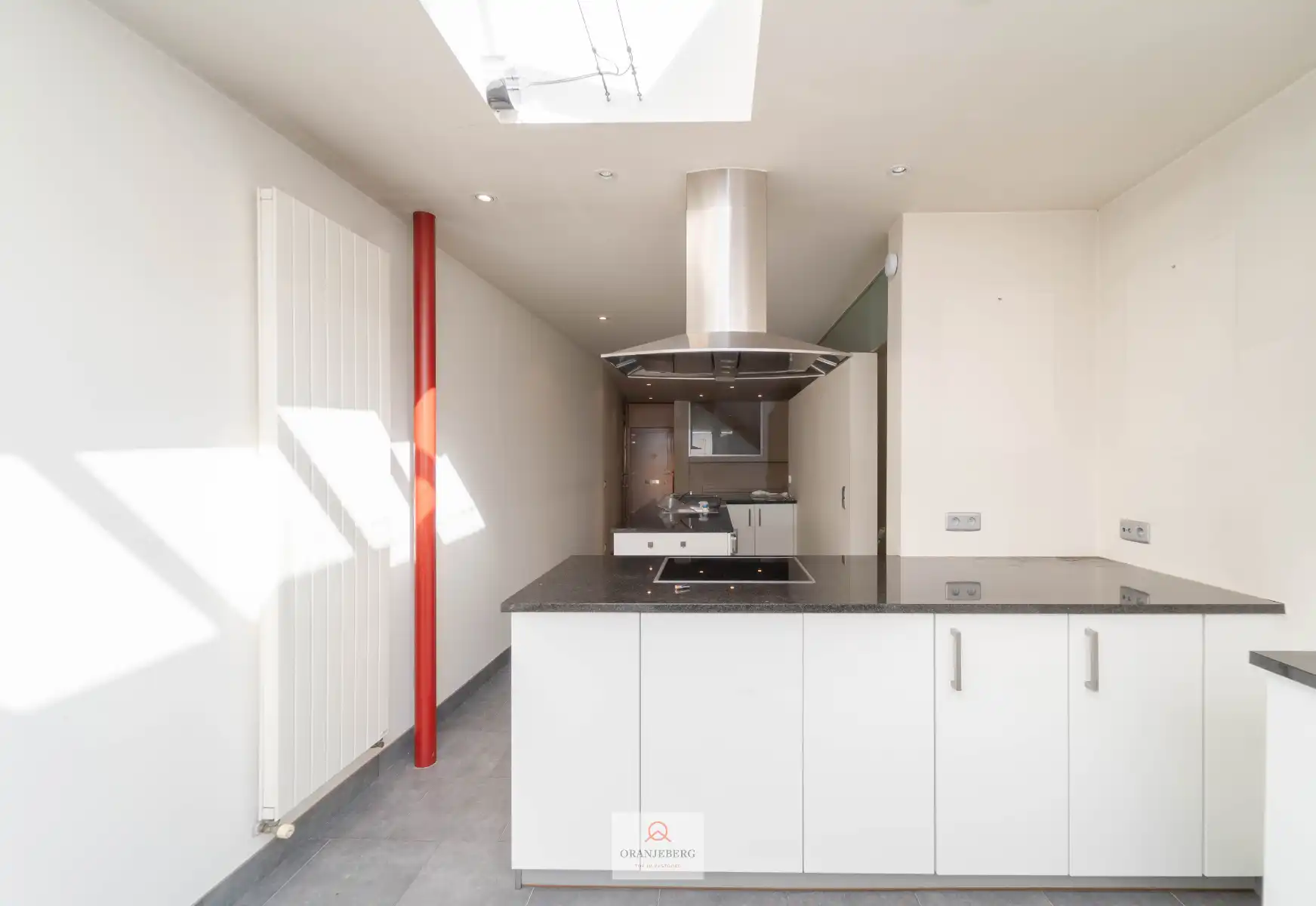 Lichtrijke woning met tuin en ruime garage aan dorpsplein Assenede foto 7