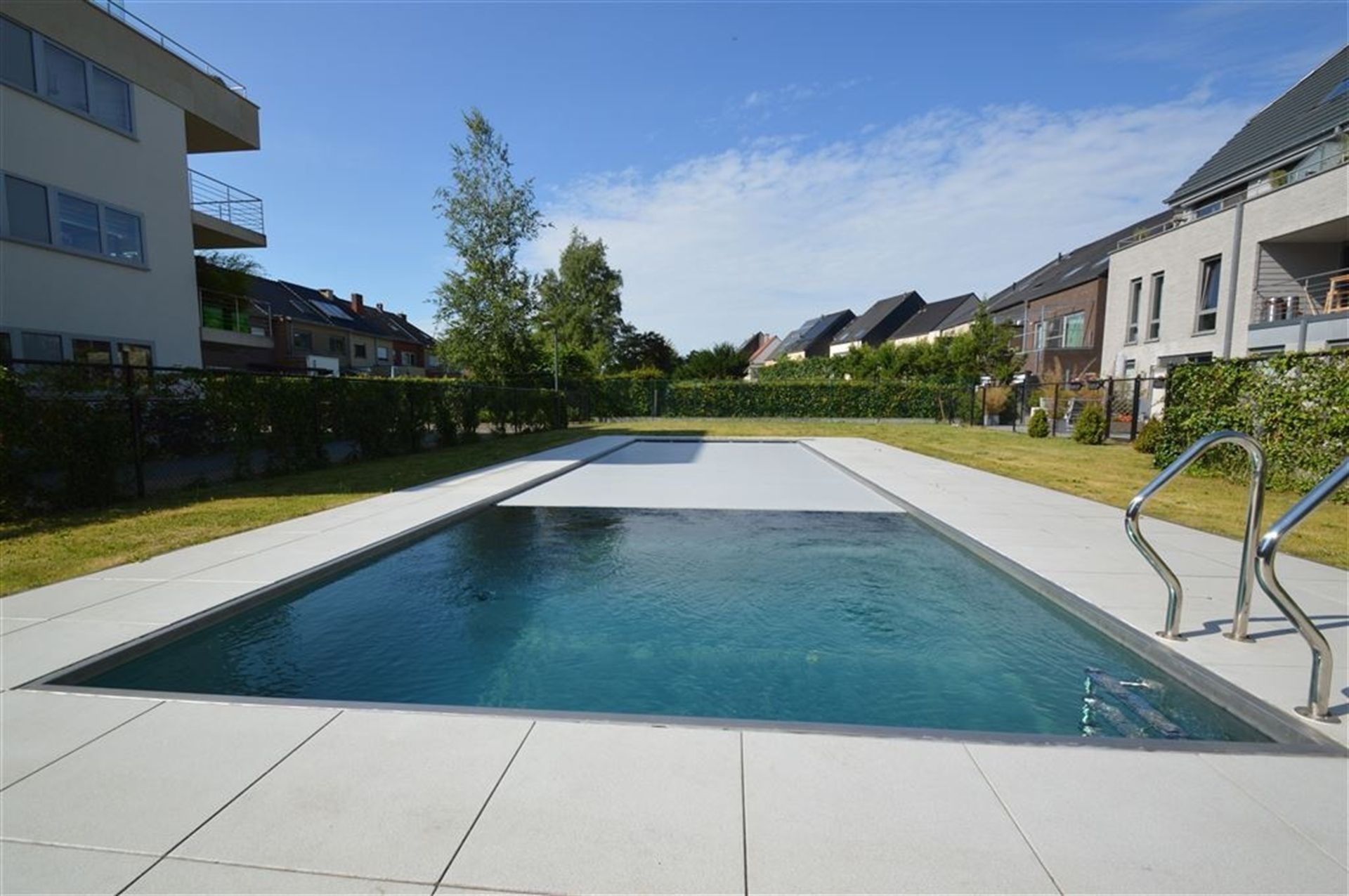 Appartement met zwembad op topligging  foto {{pictureIndex}}
