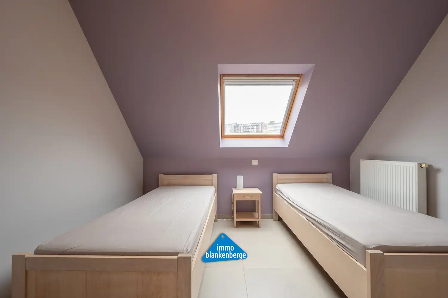 Uniek dakappartement met 3 slaapkamers en 2 badkamers. foto 12