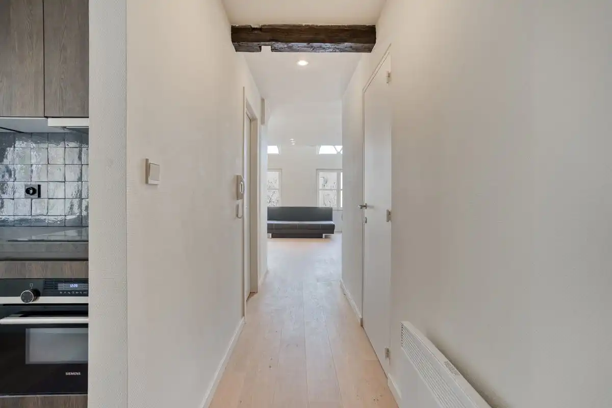 Instapklaar appartement te koop met mezzanine in Brugge foto 2
