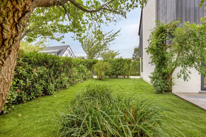 Een architecturale gezinswoning met karakter en uitzonderlijk veel ruimte foto 19