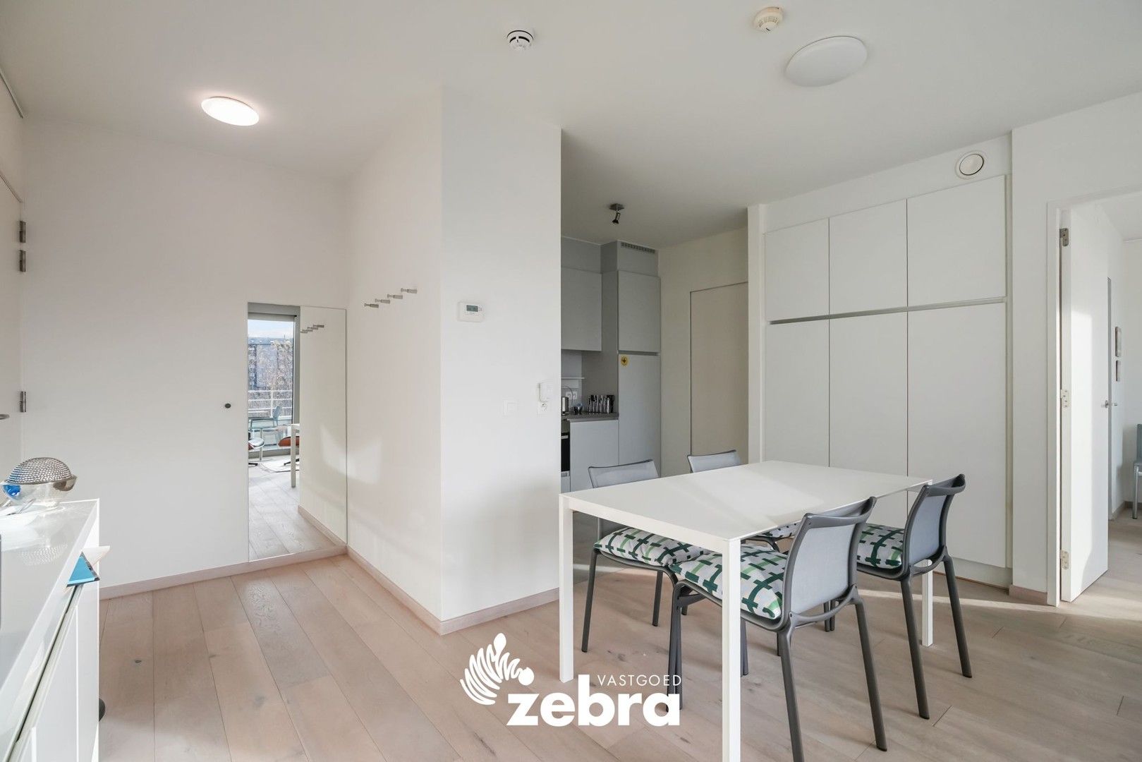 Moderne serviceflat met prachtig zicht op de Leie en autostaanplaats te Deinze! foto 9