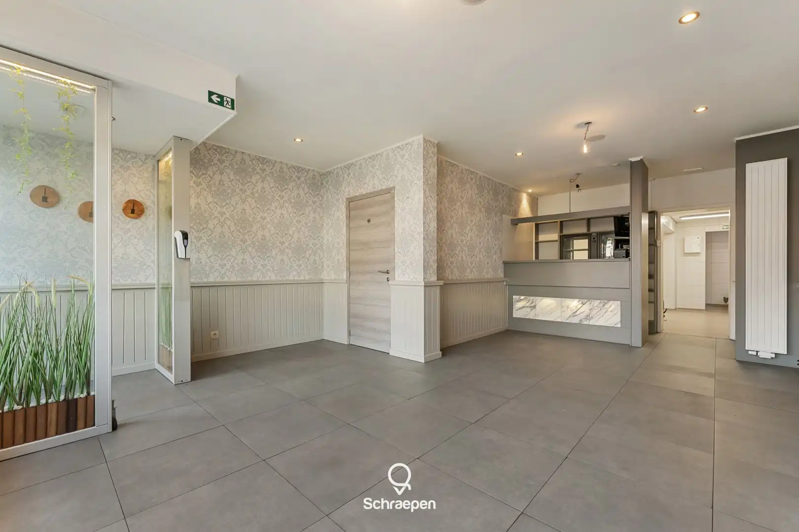 Charmante woonst met handelsruimte op absolute toplocatie in Zonhoven-centrum! foto 3