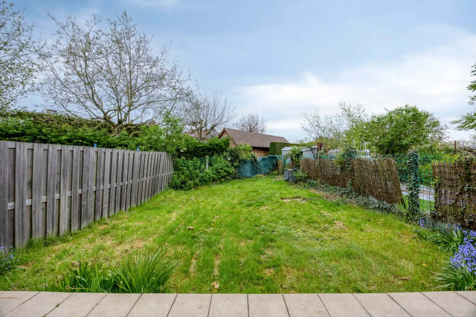 Bel-etagewoning met drie slaapkamers met garage en tuin foto 12