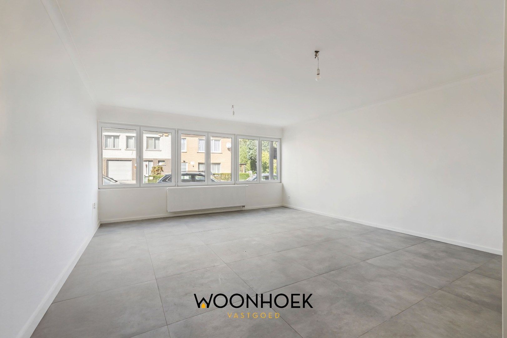 Gerenoveerd appartement op toplocatie te Belsele! foto 2