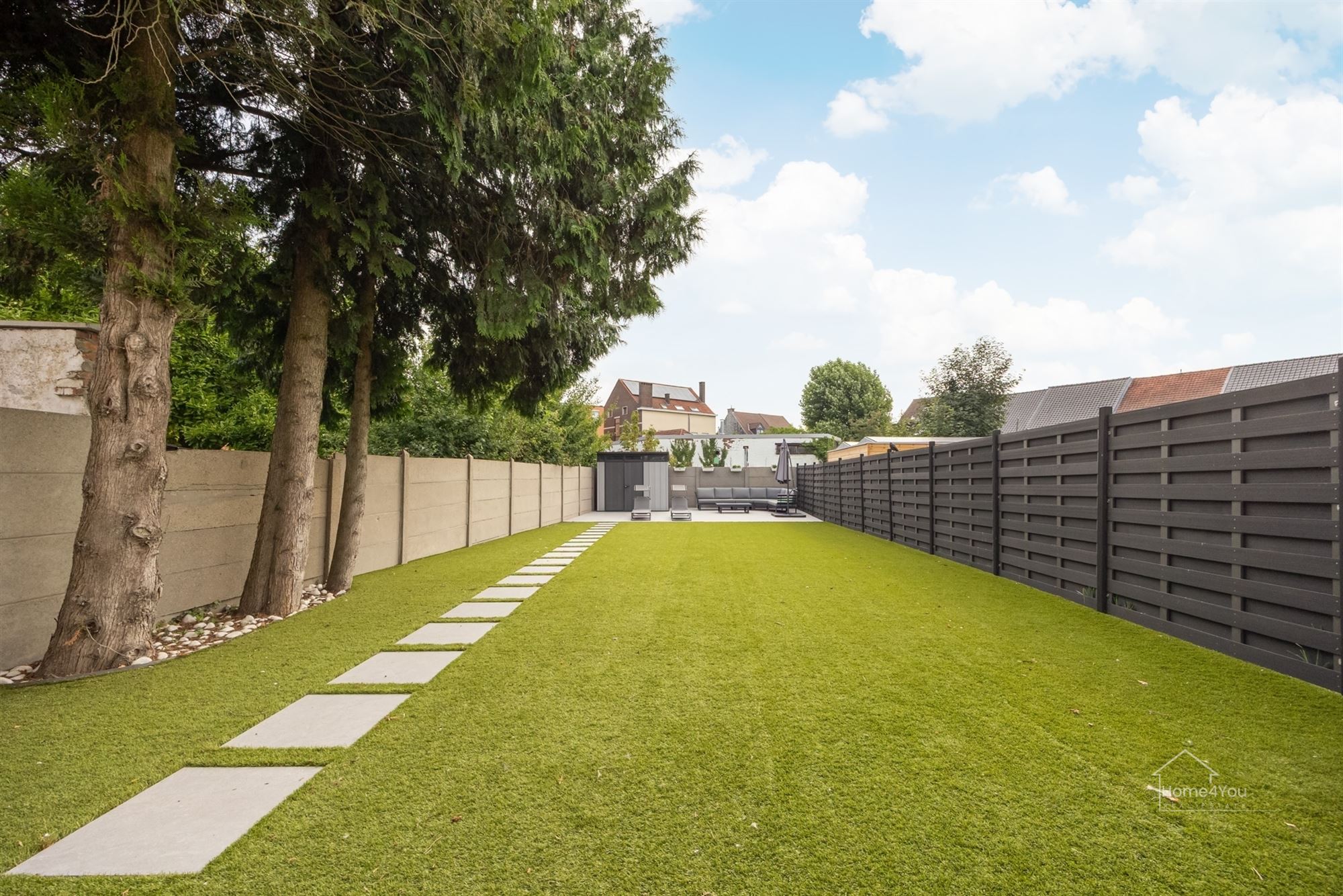 Gelijkvloers appartement met zeer grote tuin foto 12