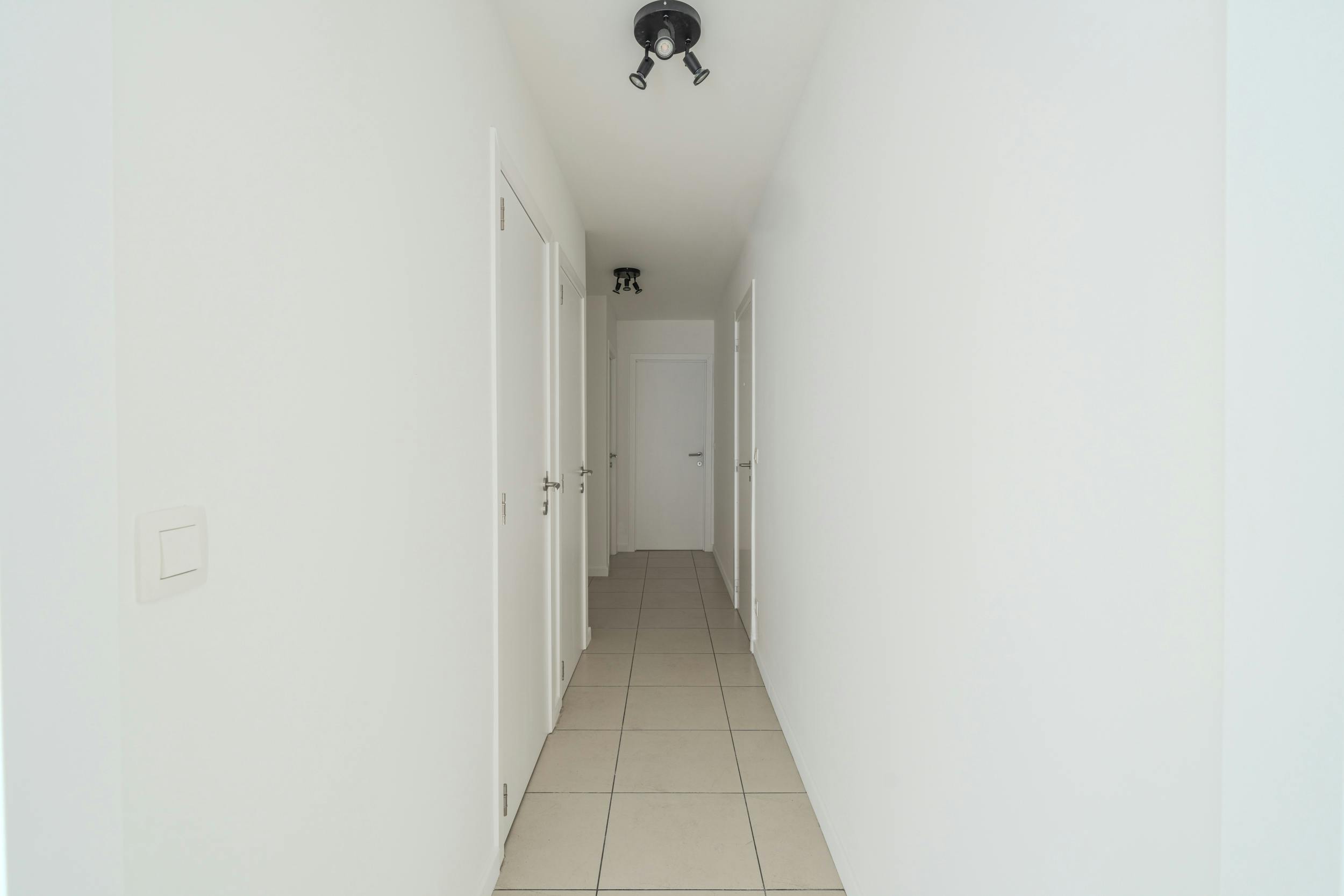 Gelijkvloers 2-slaapkamerappartement met terras te Oostende foto 11