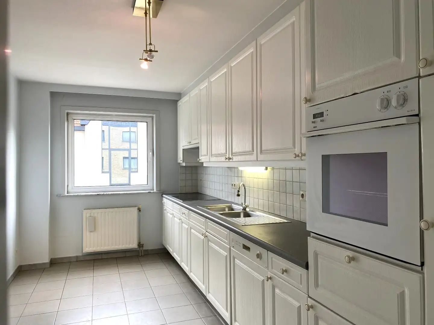 GEZELLIG APPARTEMENT MET 2 SLPKS EN GARAGEBOX | GEZELLIG TERRAS foto 3