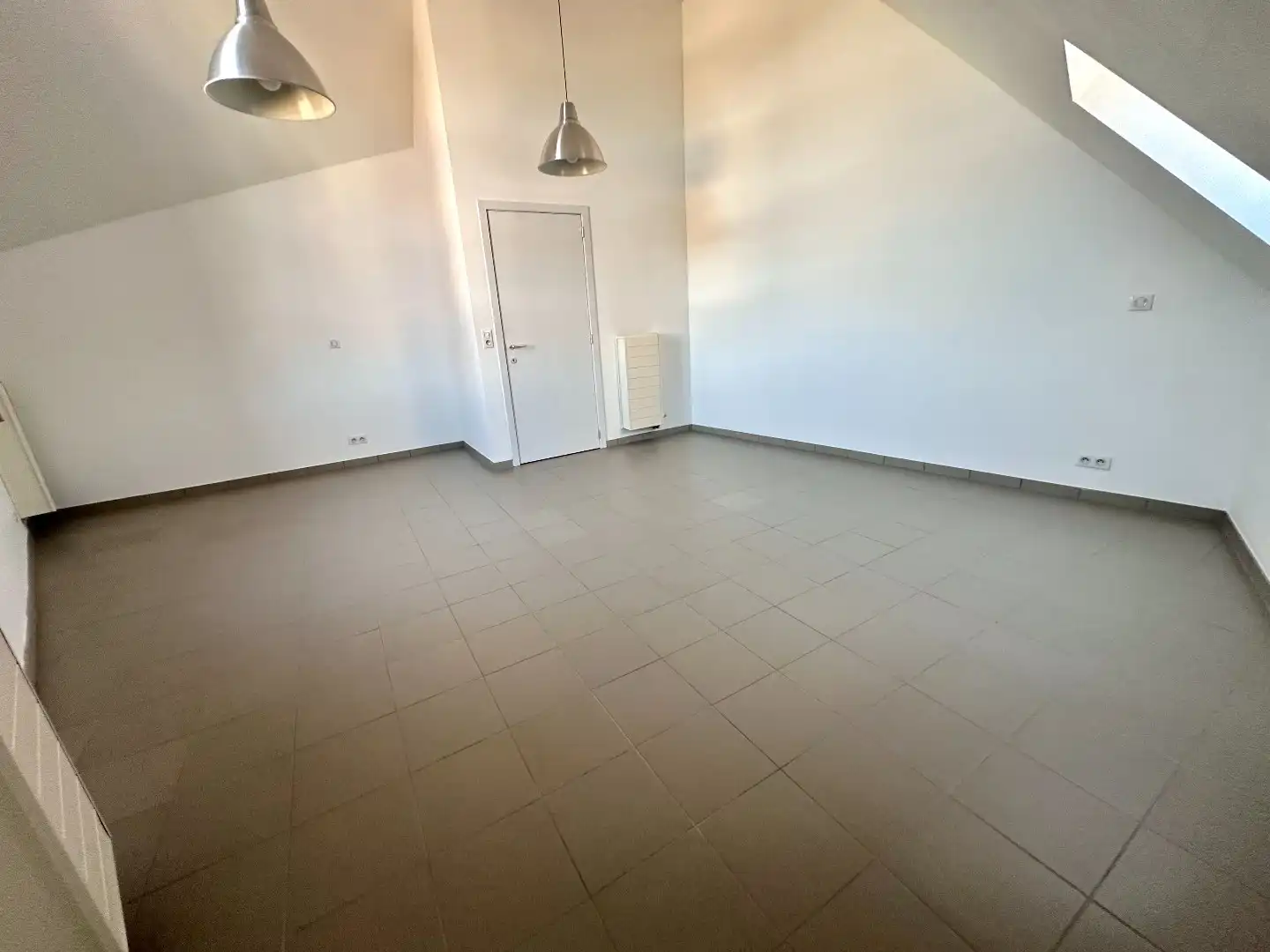 Gezellig duplexappartement op de 2e verdieping, centraal gelegen in het hart van Tongeren. foto 10