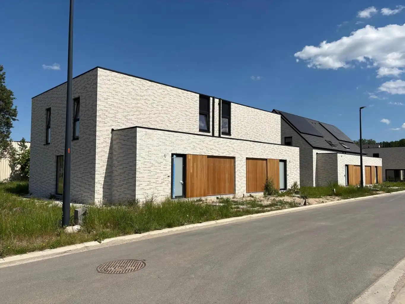 immo DAVID stelt voor: 14 nieuwbouwwoningen te Opwijk foto {{pictureIndex}}